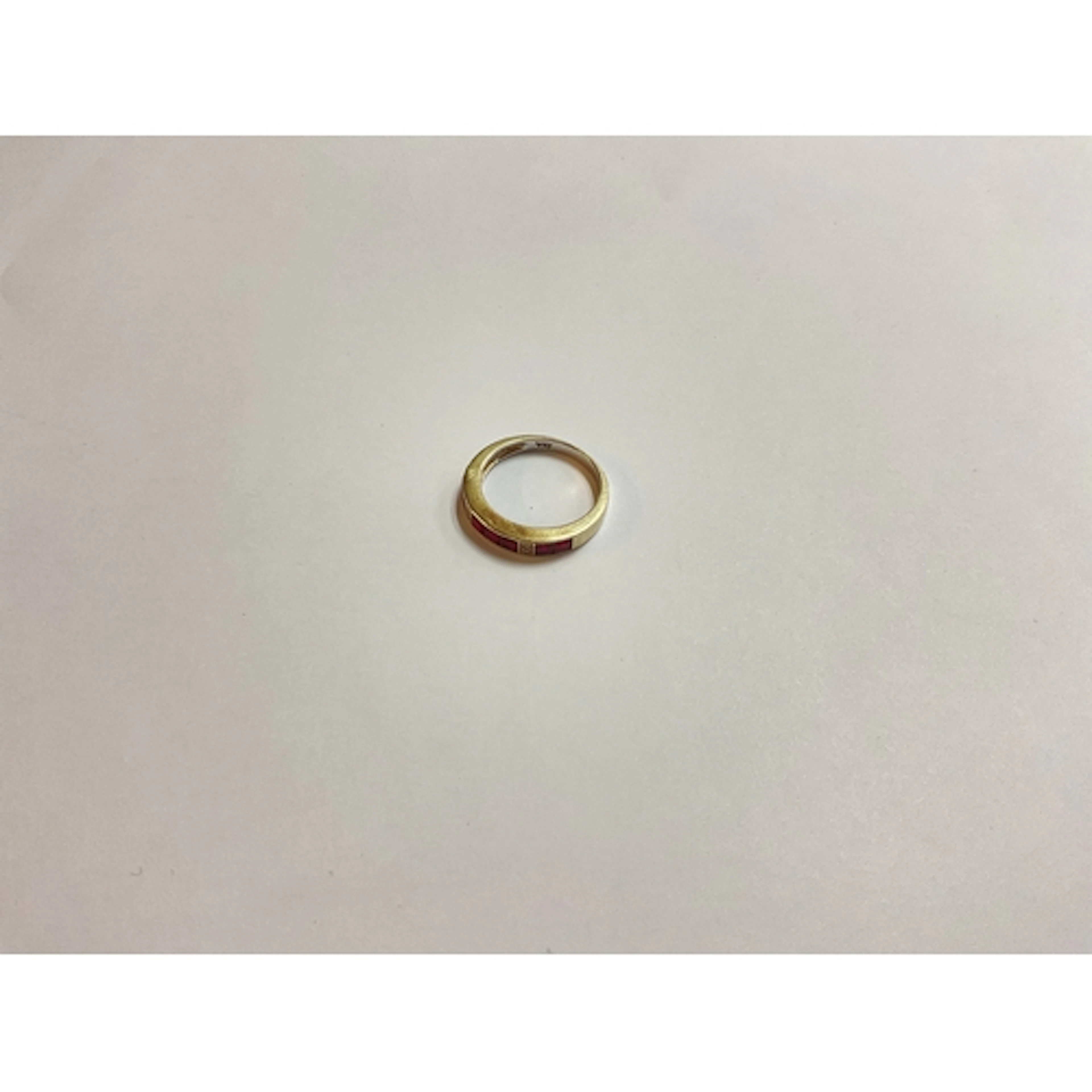 A diamond and ruby set 9ct gold ring 3g