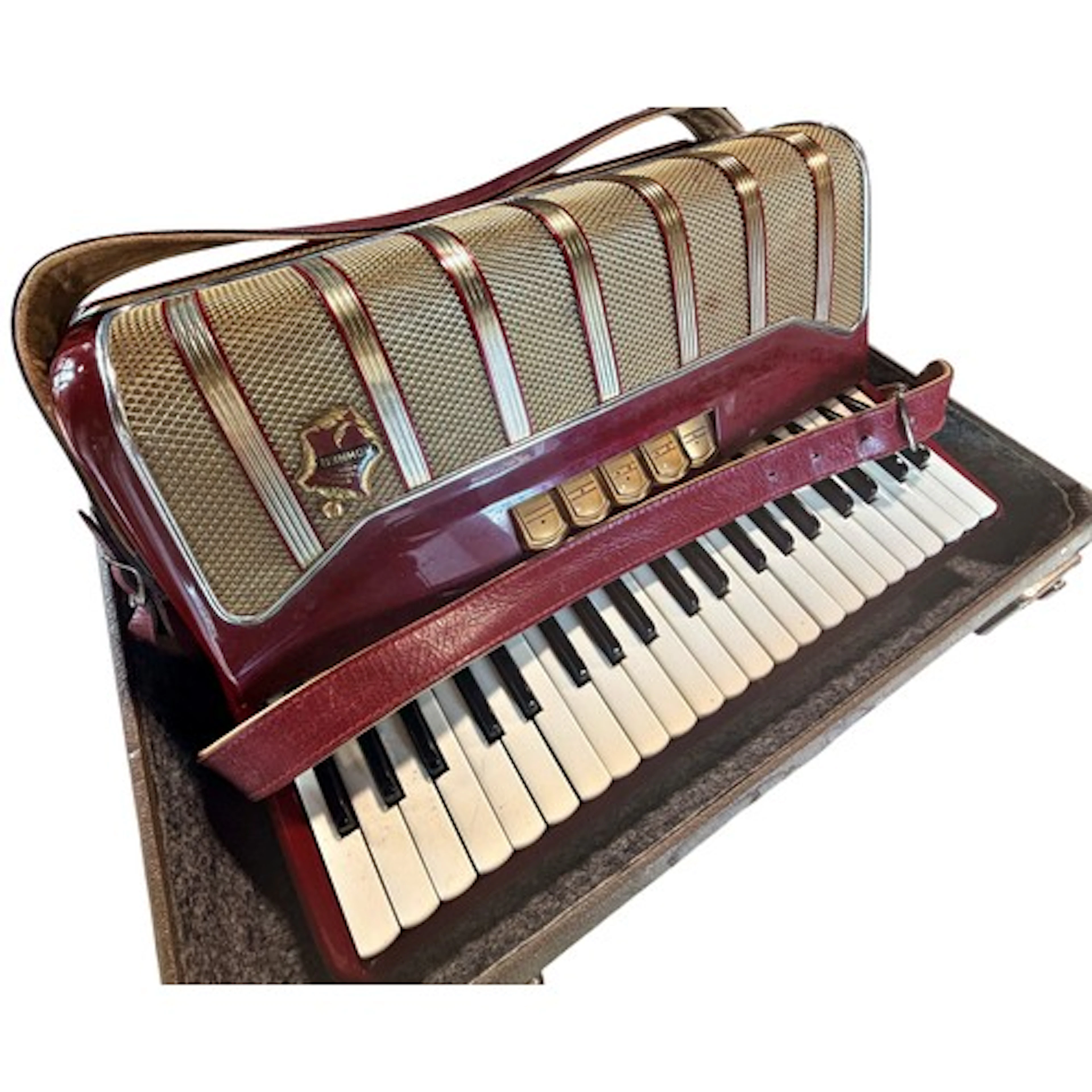 A cased Hohner Priola III piano accordion