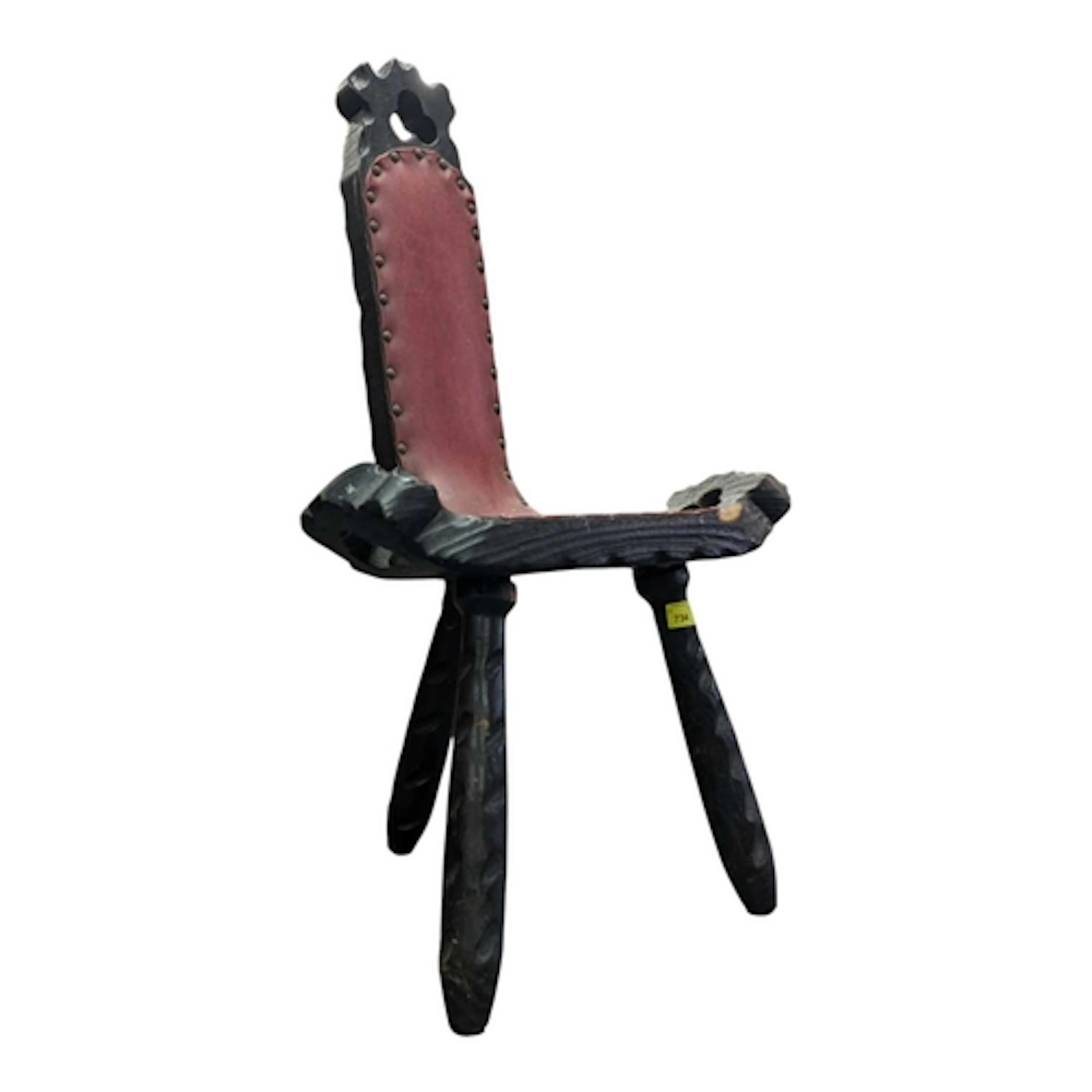 A 20th century Spanish oak birthing chair. The chair having ...