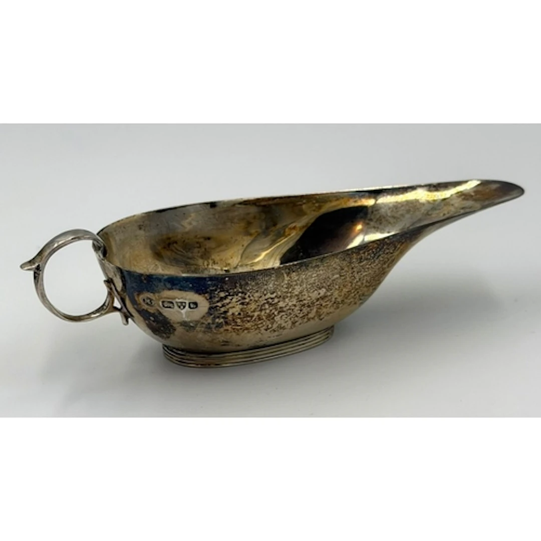 A hallmarked silver sauce boat, approximate weight 65g, hall...