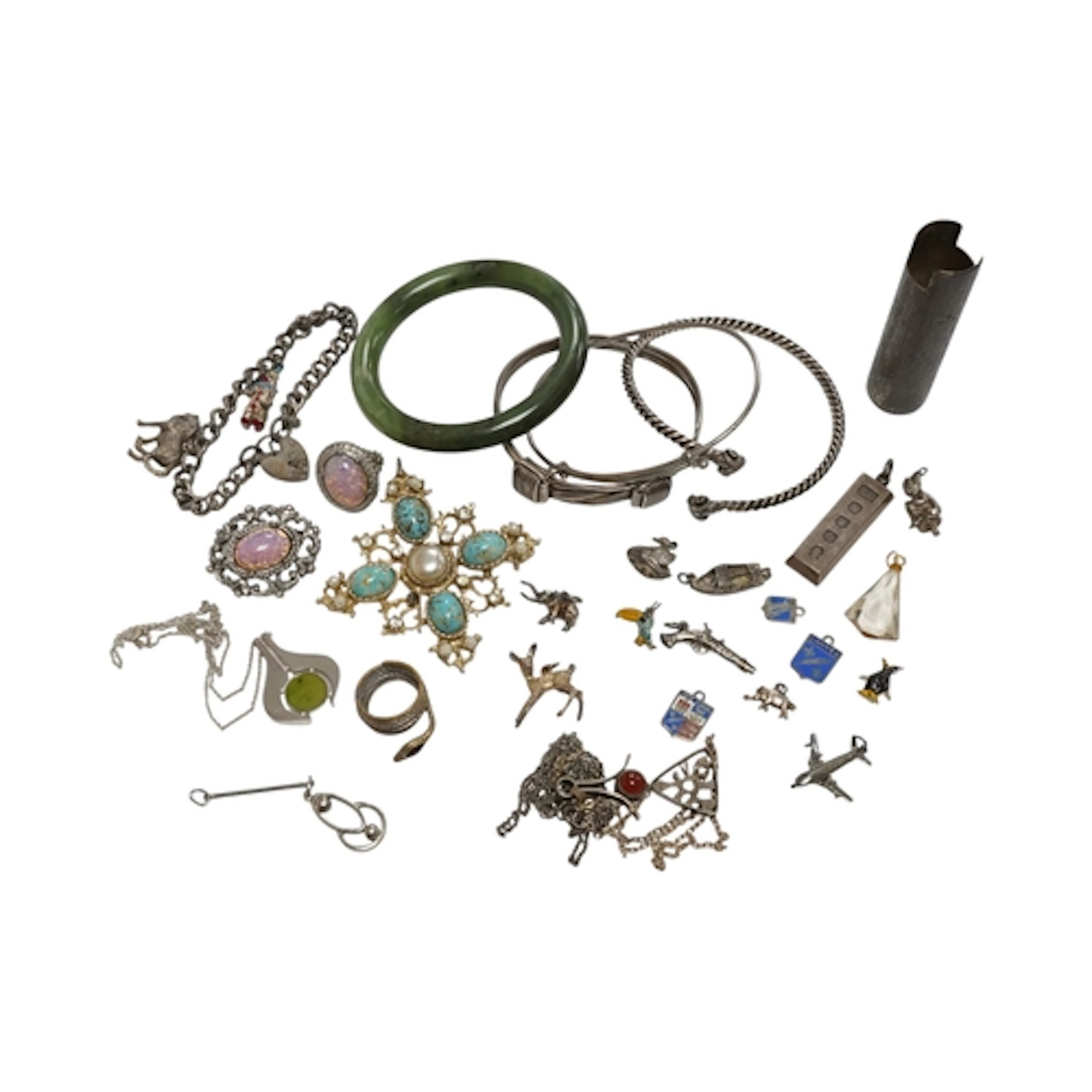 A group of costume jewels, including a jadeite bangle, a rop...