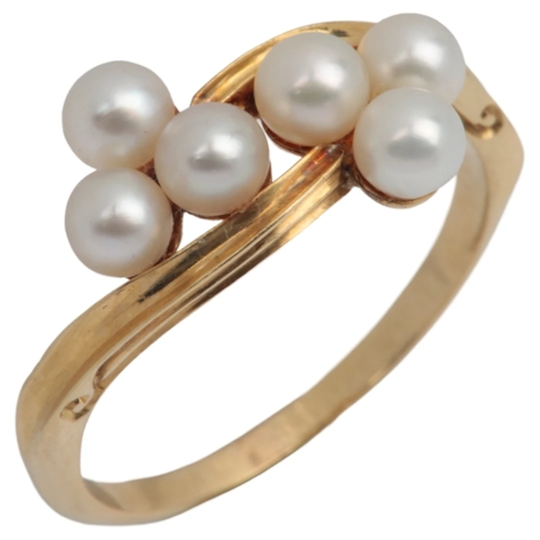 A gold and pearl ring, early 20th century, of crossover desi...