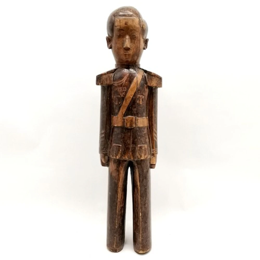WWI antique carved German East African figure depicting a Eu...