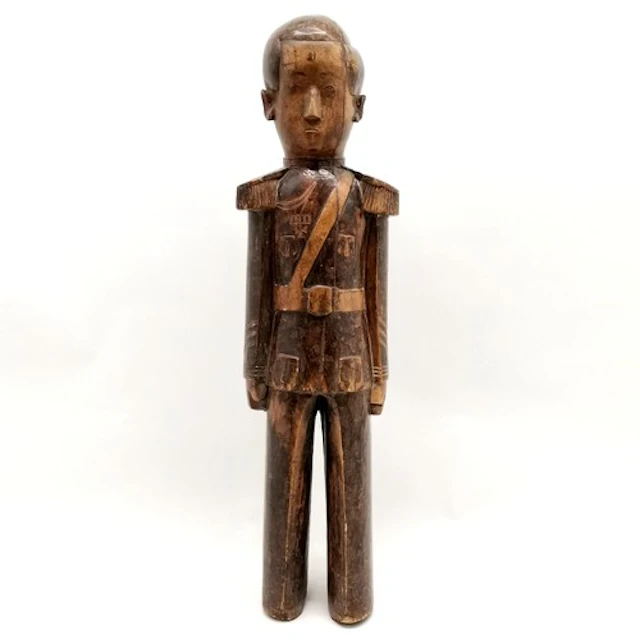 WWI antique carved German East African figure depicting a Eu...