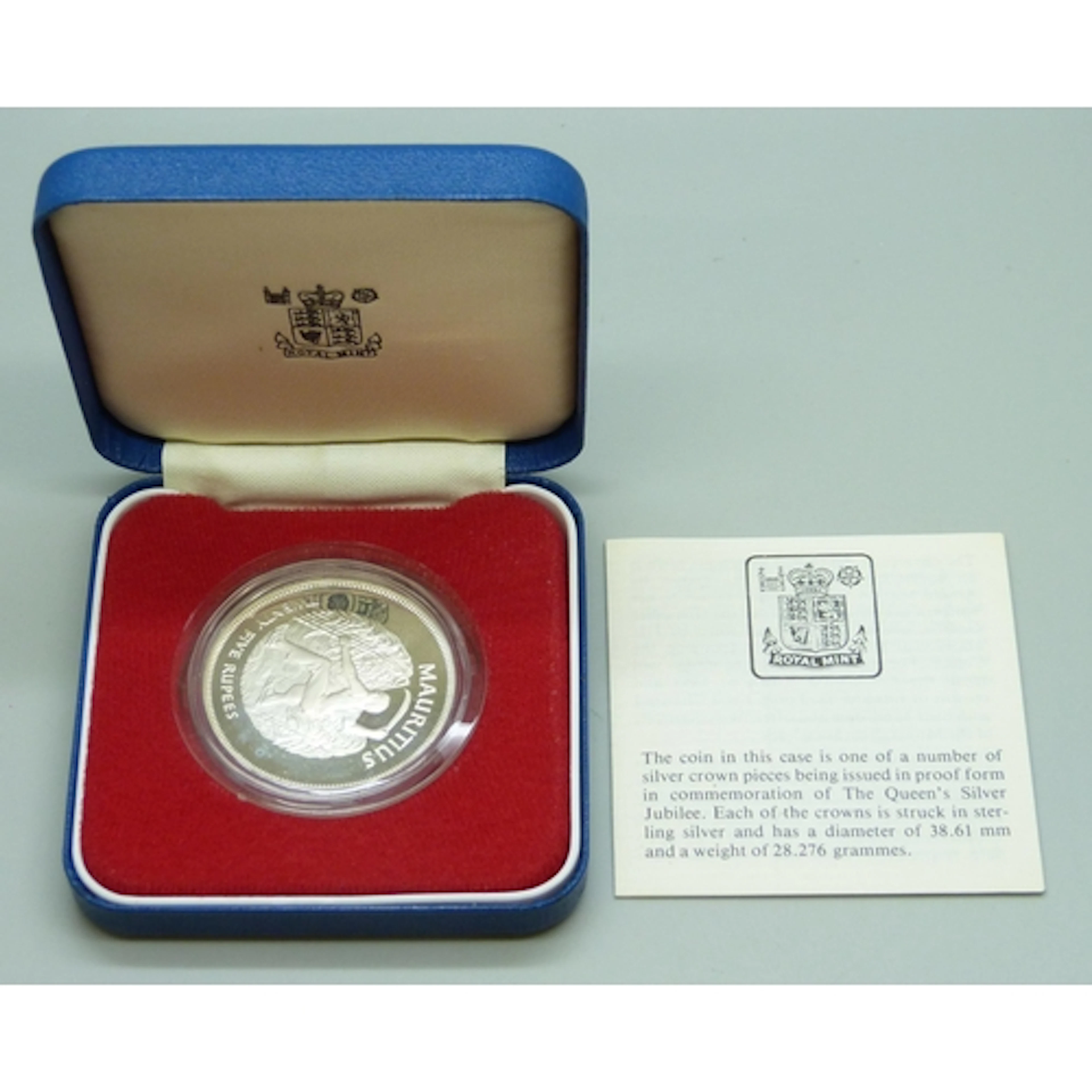 Coins - A 1977 Royal Mint Mauritius Silver Jubilee proof cro...