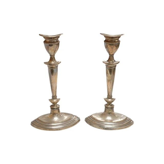 A pair of George V silver mounted oval candlesticks, William...