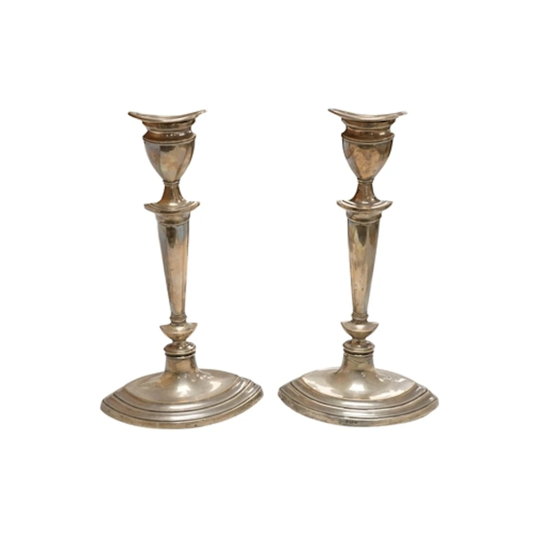 A pair of George V silver mounted oval candlesticks, William...
