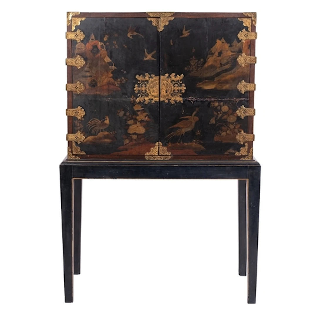 A Chinese lacquered wood cabinet on stand, early 20th centur...