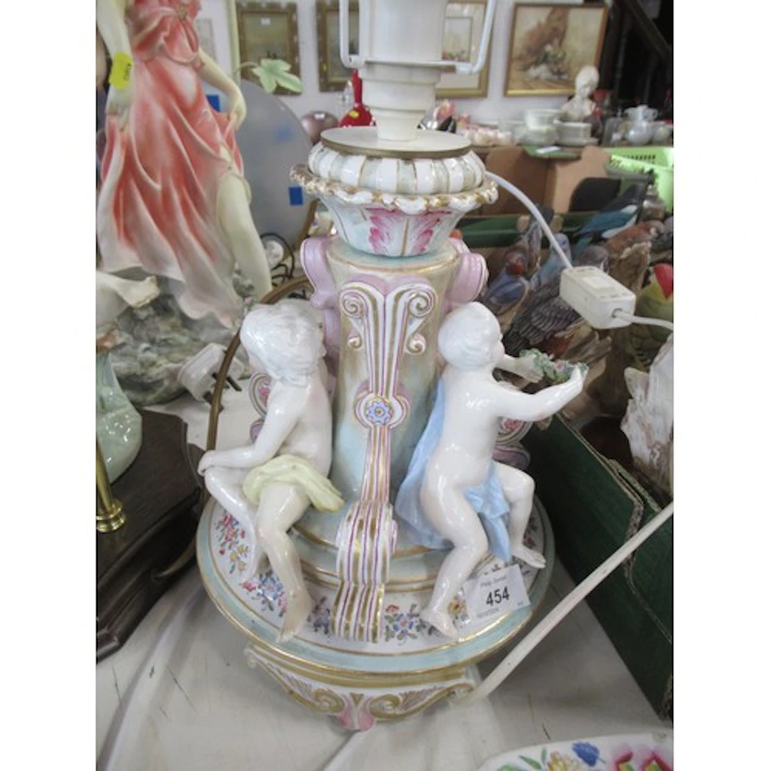 A continental cherub table lamp