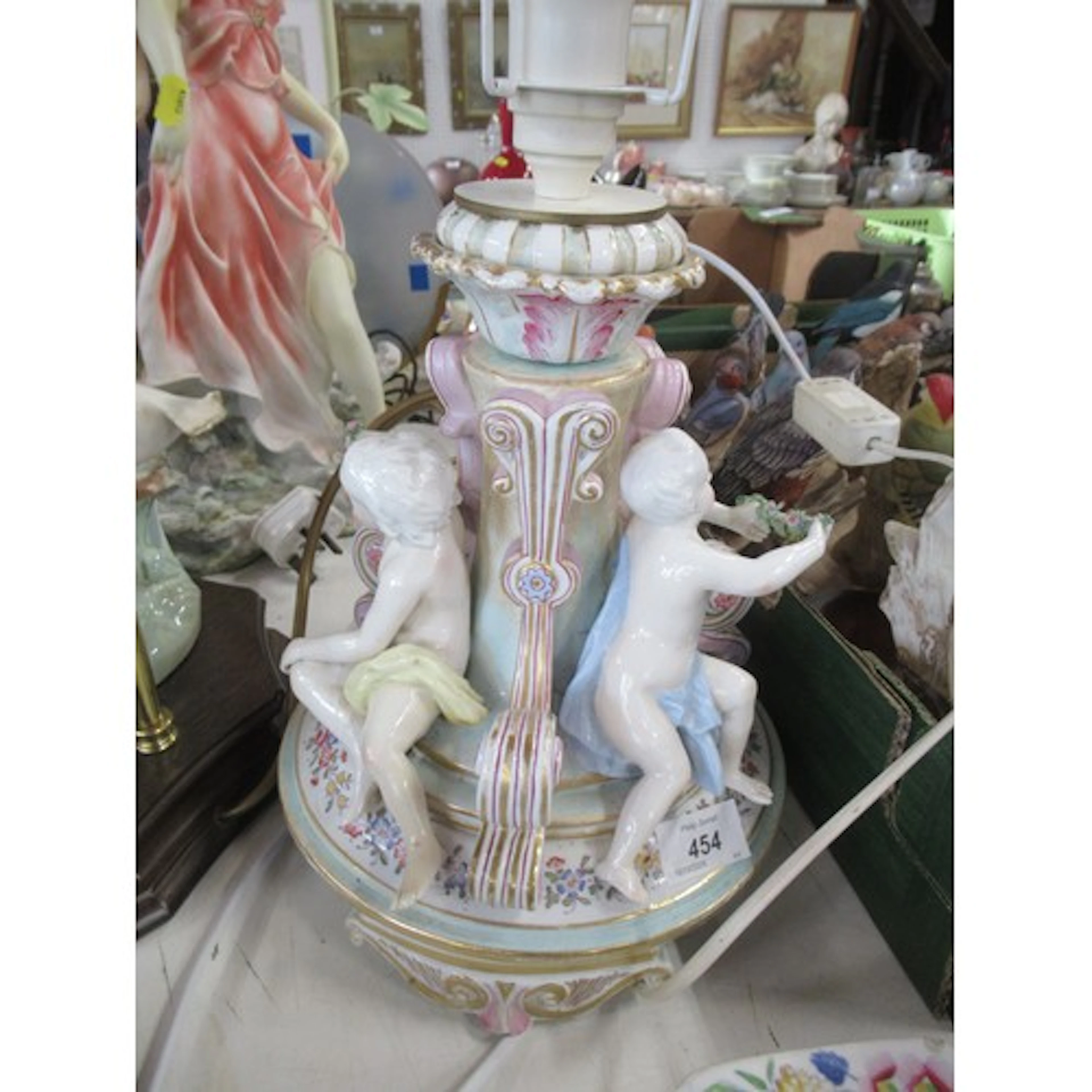 A continental cherub table lamp