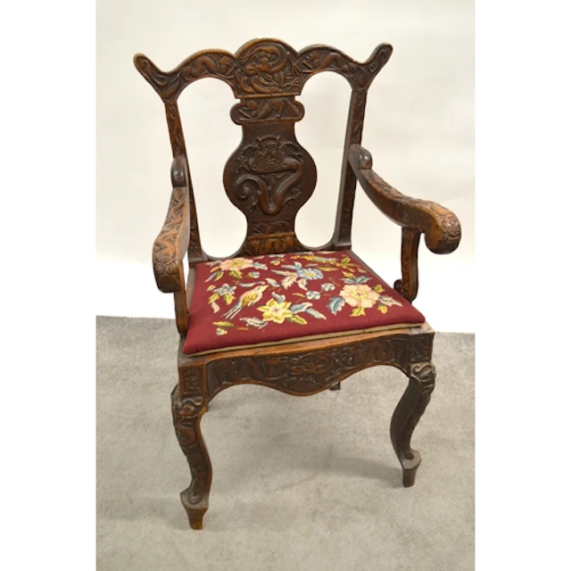 Anglo Burmese carved hardwood open elbow chair