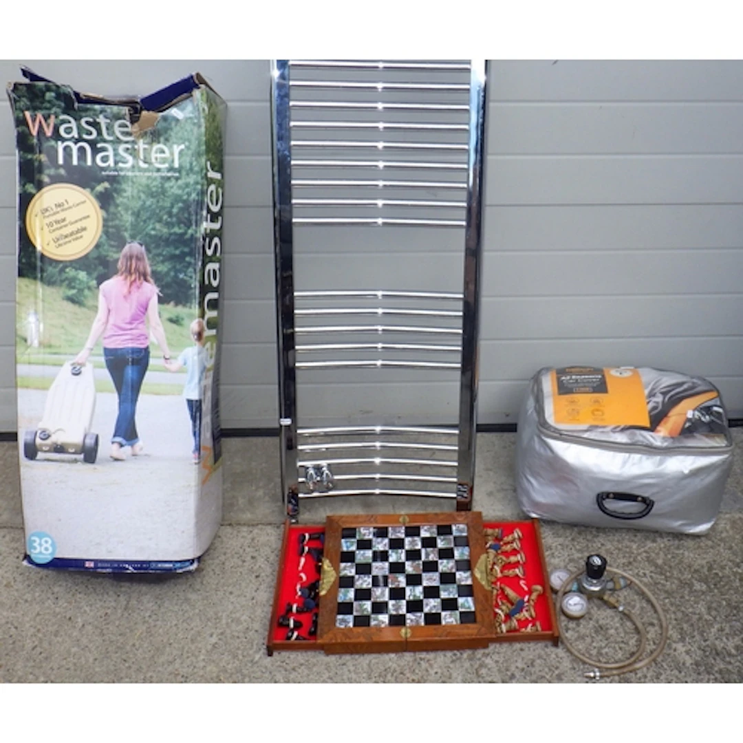 A heated towel rail, chess set, car cover, valve, water carr...