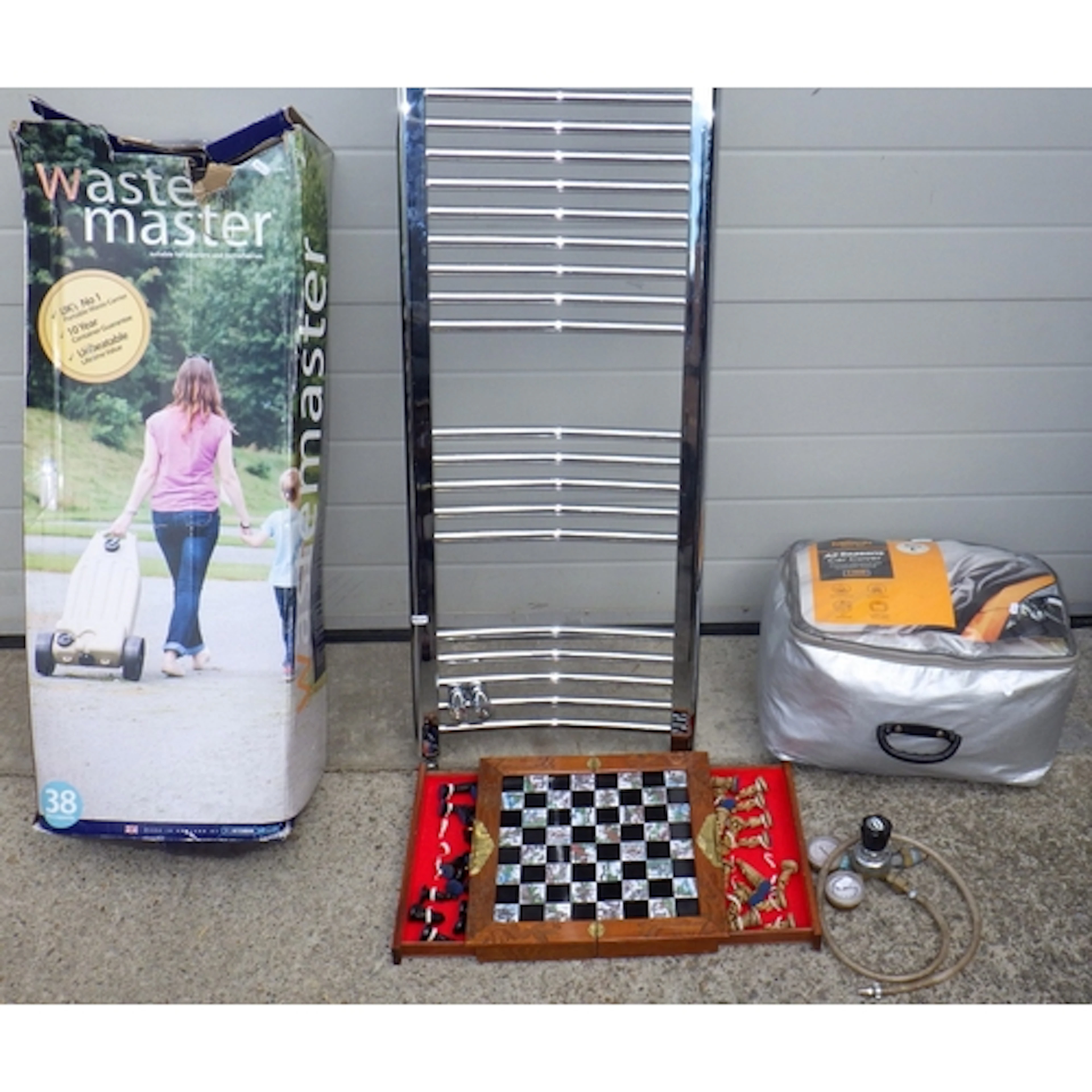 A heated towel rail, chess set, car cover, valve, water carr...