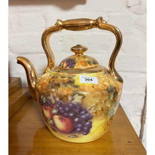 Large fruit decorated and gilt porcelain tea kettle