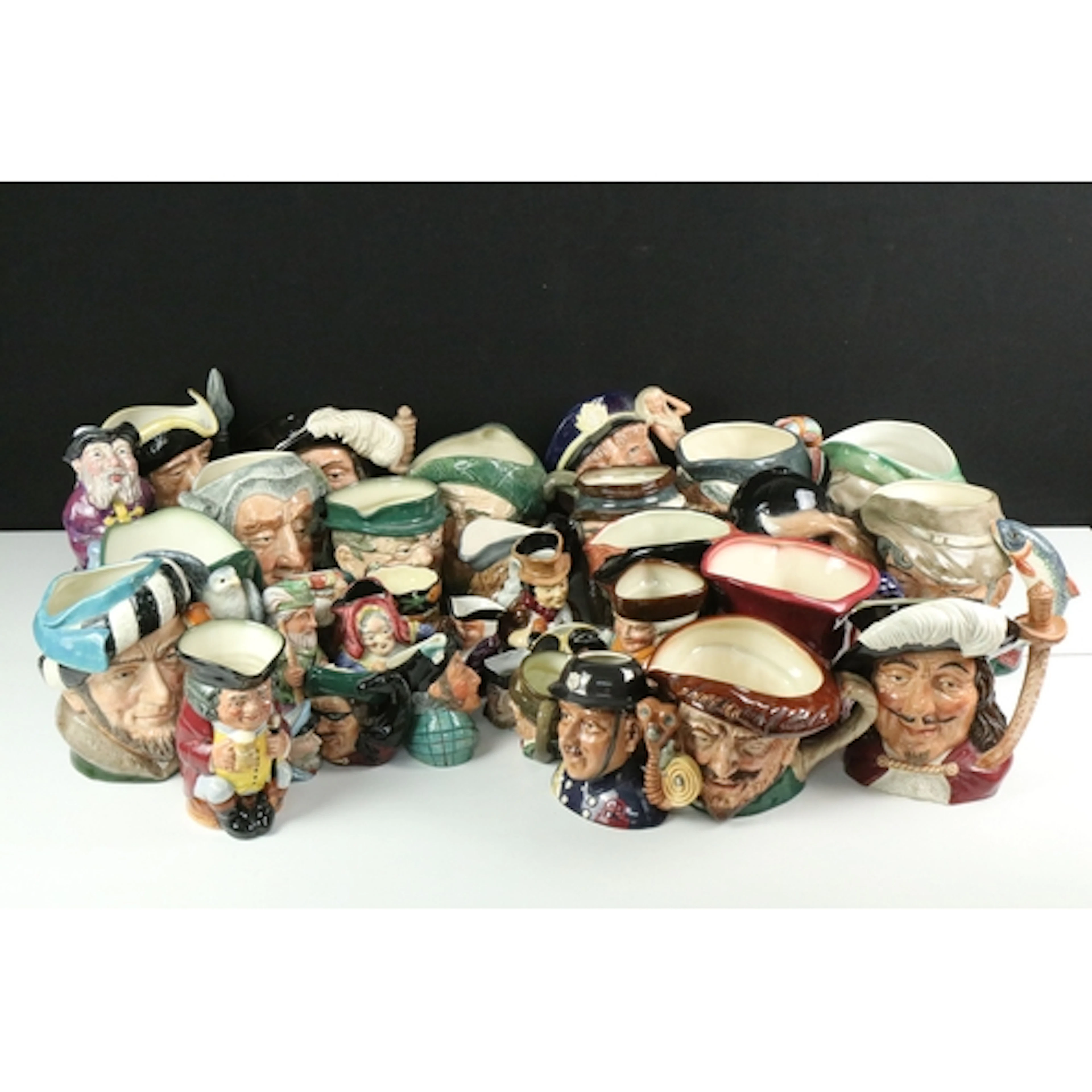 Large collection of character jugs, to comprise Royal Doulto...