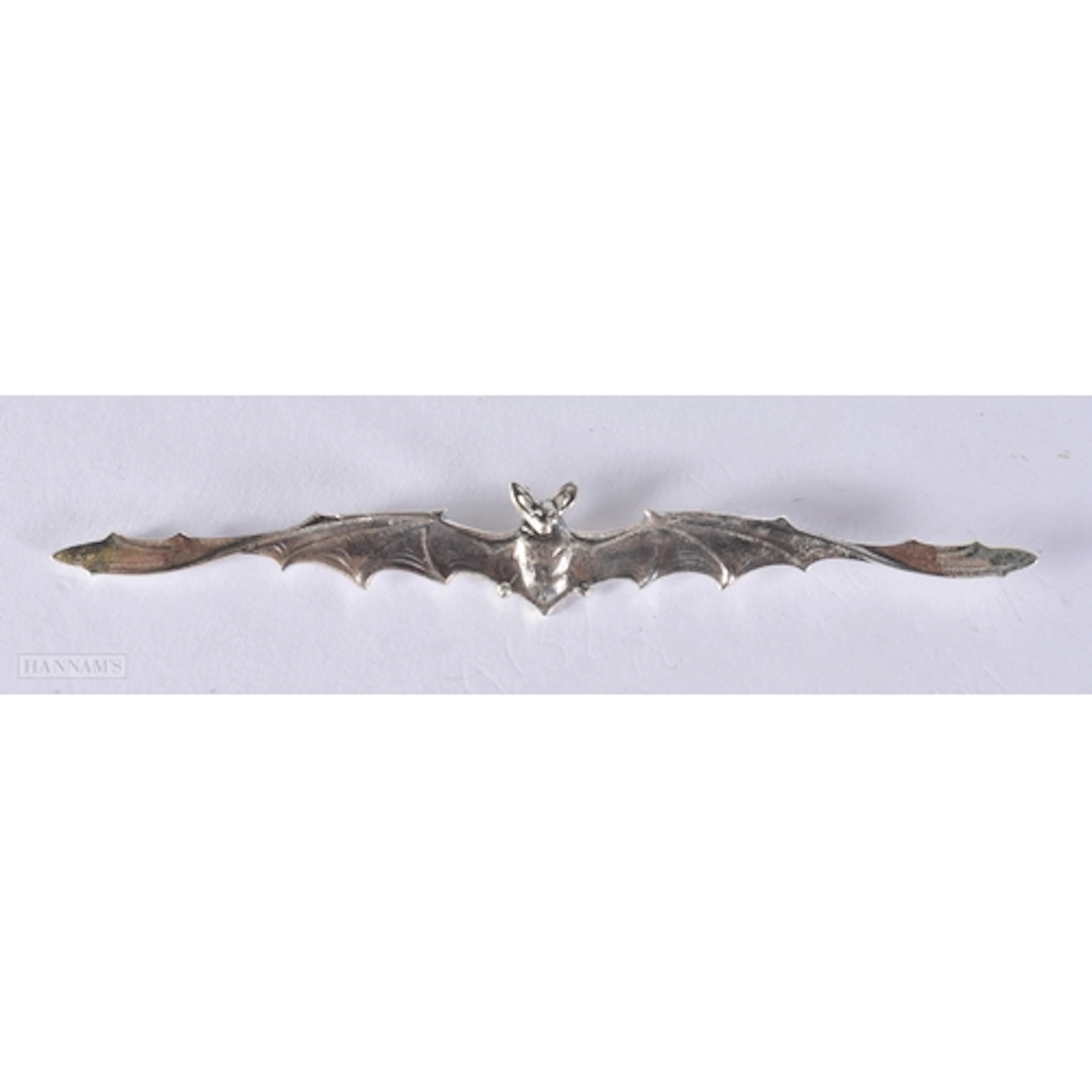 A SILVER BAT BROOCH. 1.6 x 11.7 cm. 7.5 grams