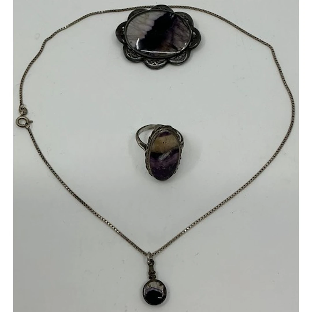 A blue john silver mounted oval brooch, 44mm x 35mm overall,...