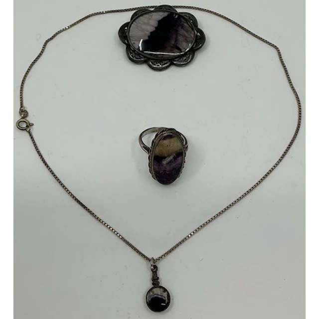 A blue john silver mounted oval brooch, 44mm x 35mm overall,...