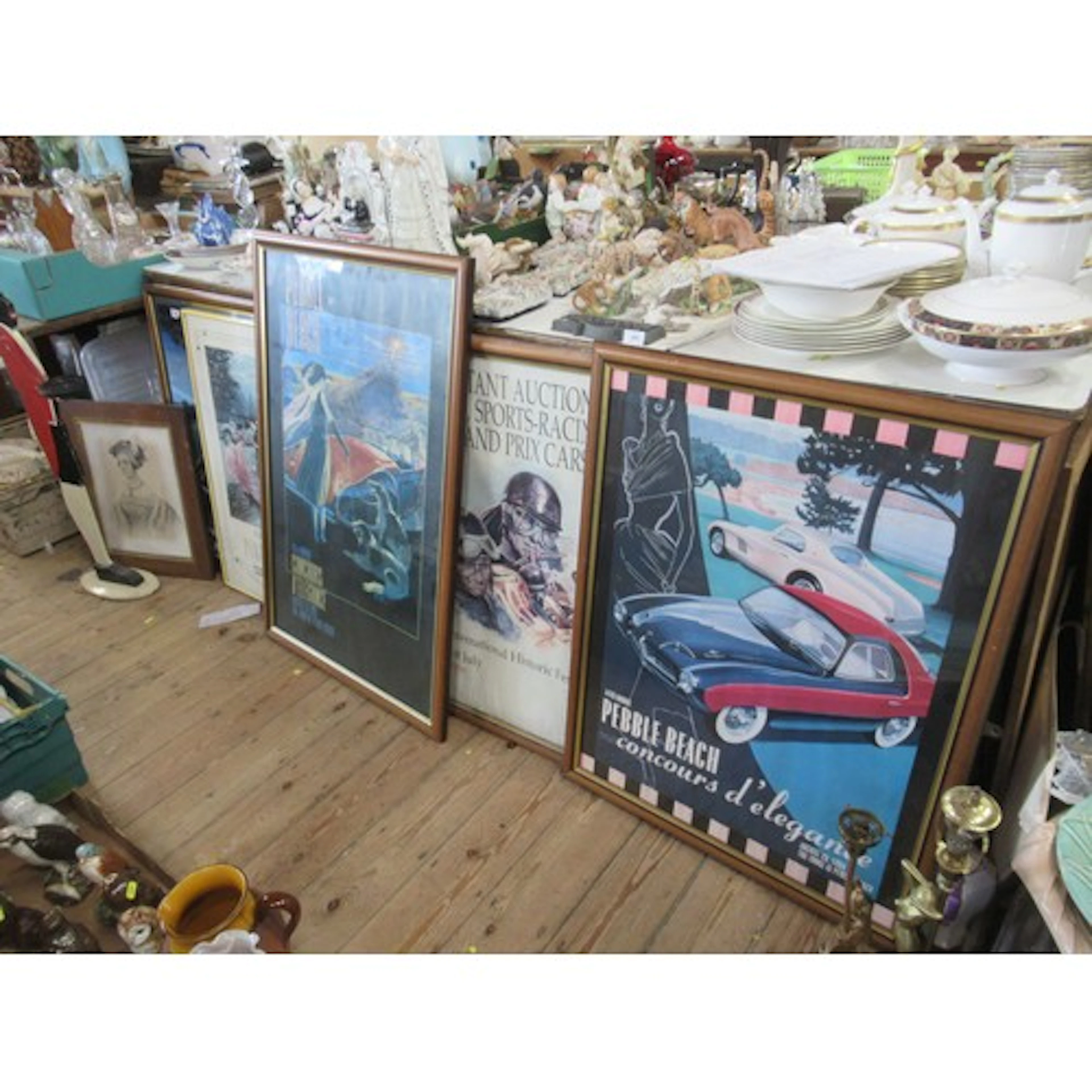 A collection of motoring related posters, including Pebble B...