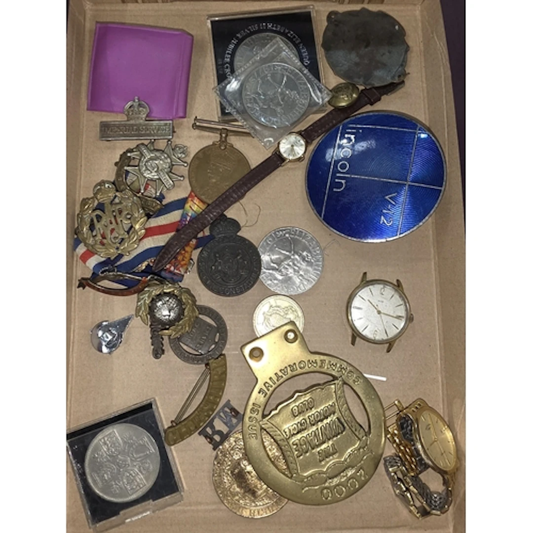 A Special Constabulary medal, other military badges etc.