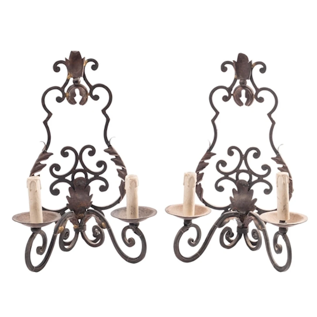 A set of four wrought iron twin-light wall appliques, 20th c...