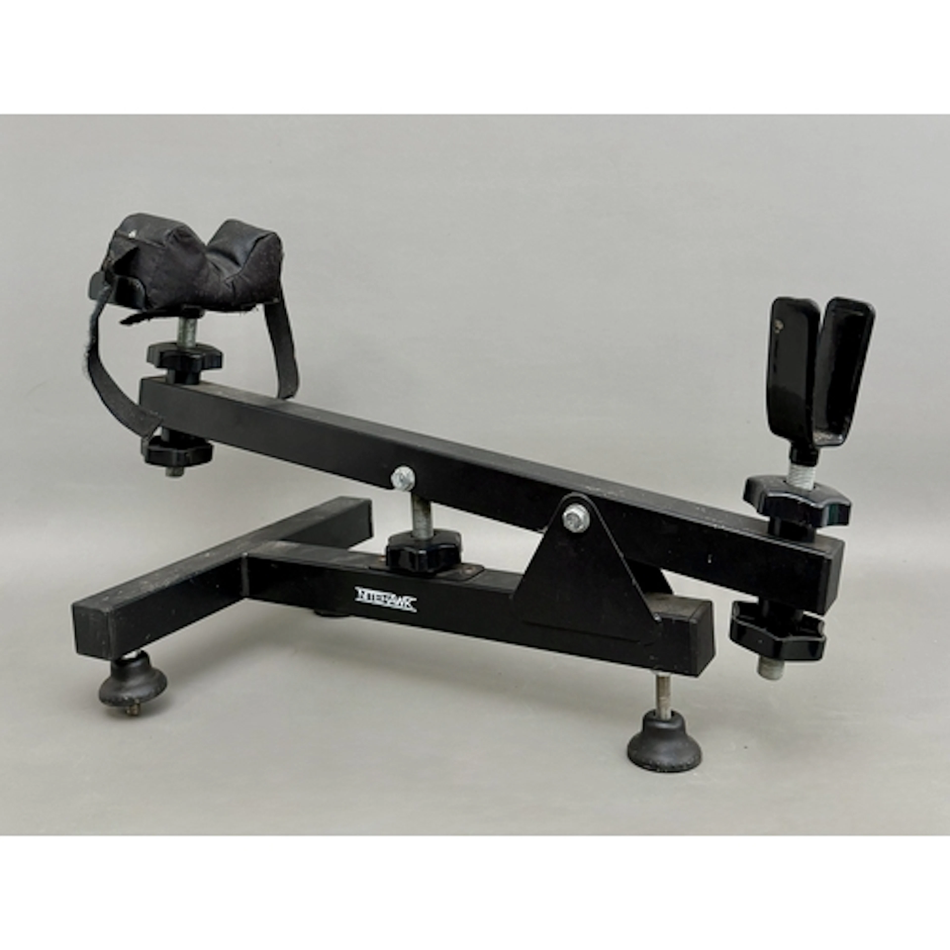 A Nitehawk rifle bench shooting rest - black painted metal w...