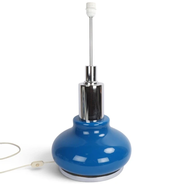 A large mid-century German table lamp, with illuminating blu...