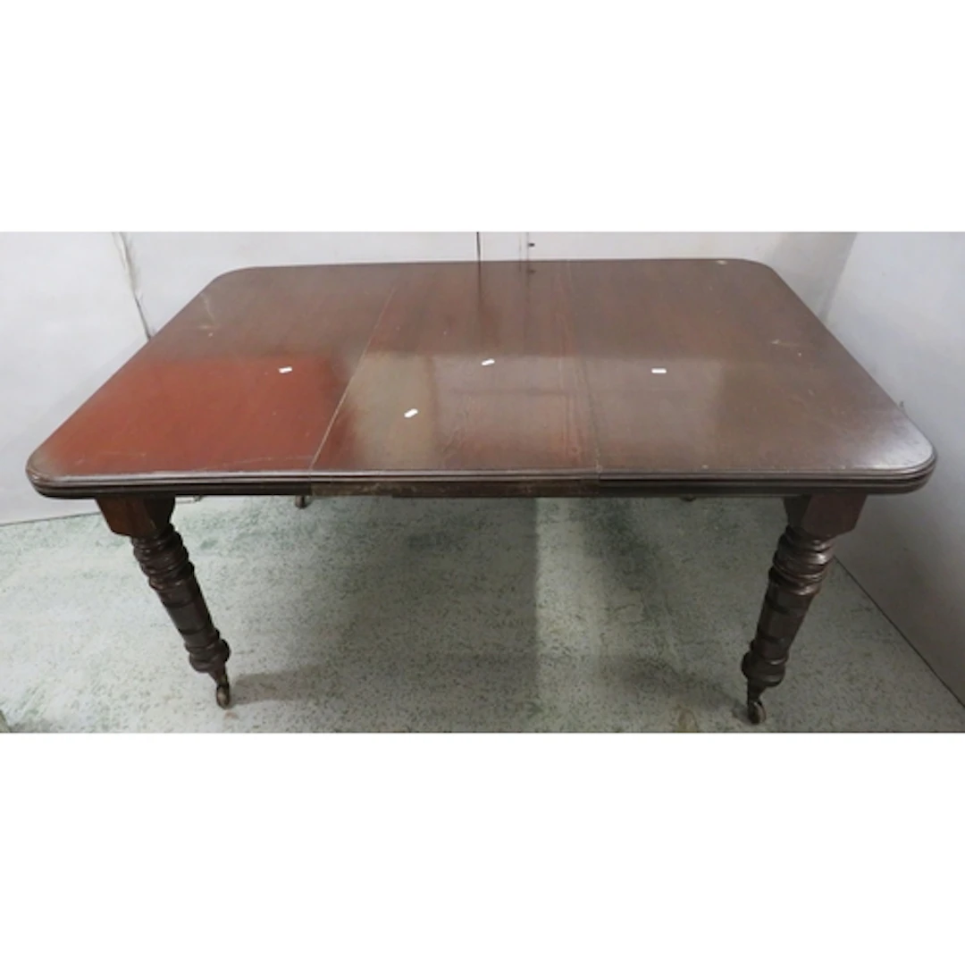 Antique Victorian Dark Wooden Wind Out Table with central le...