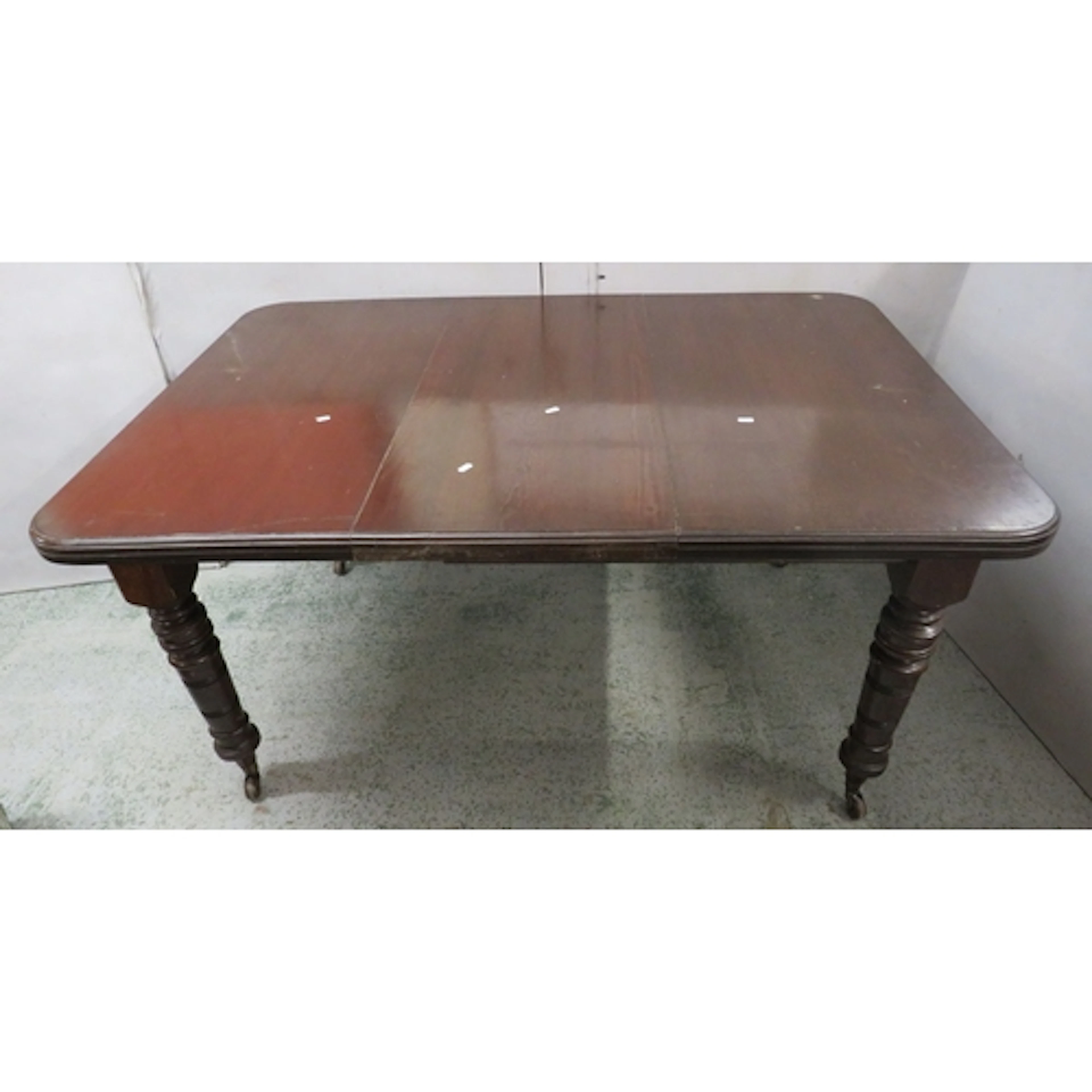 Antique Victorian Dark Wooden Wind Out Table with central le...