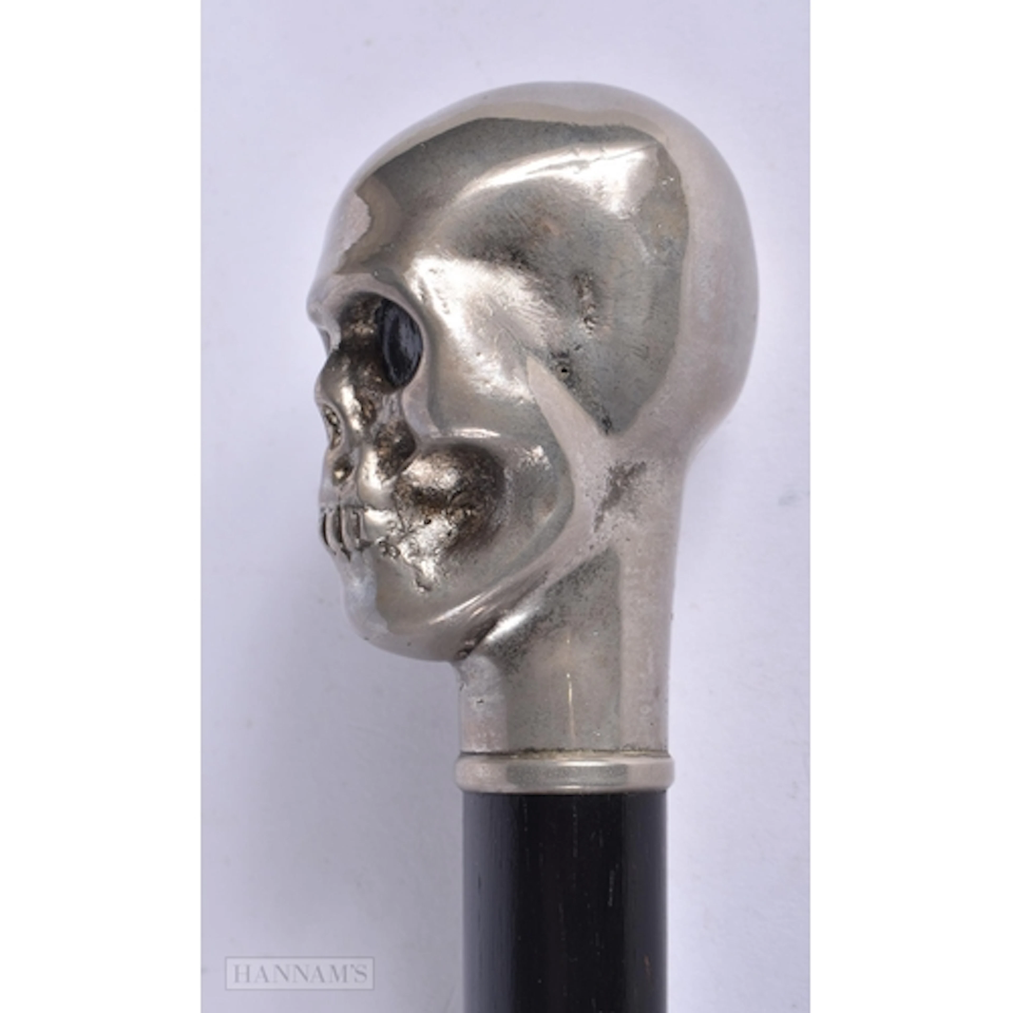 A skull handled sword stick the blade stamped London 1879 90...