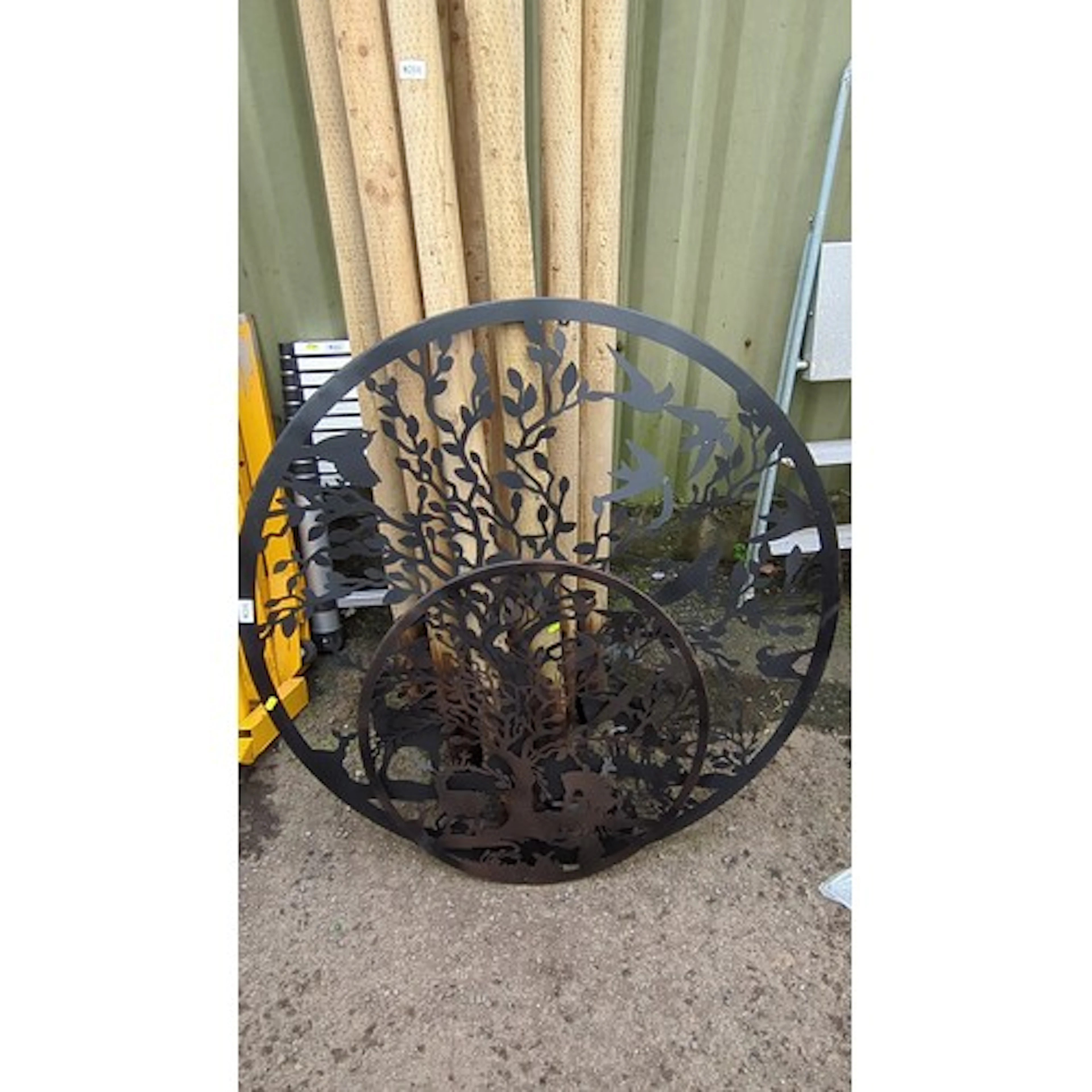 A set of 2 circular laser-cut metal garden panels, each with...