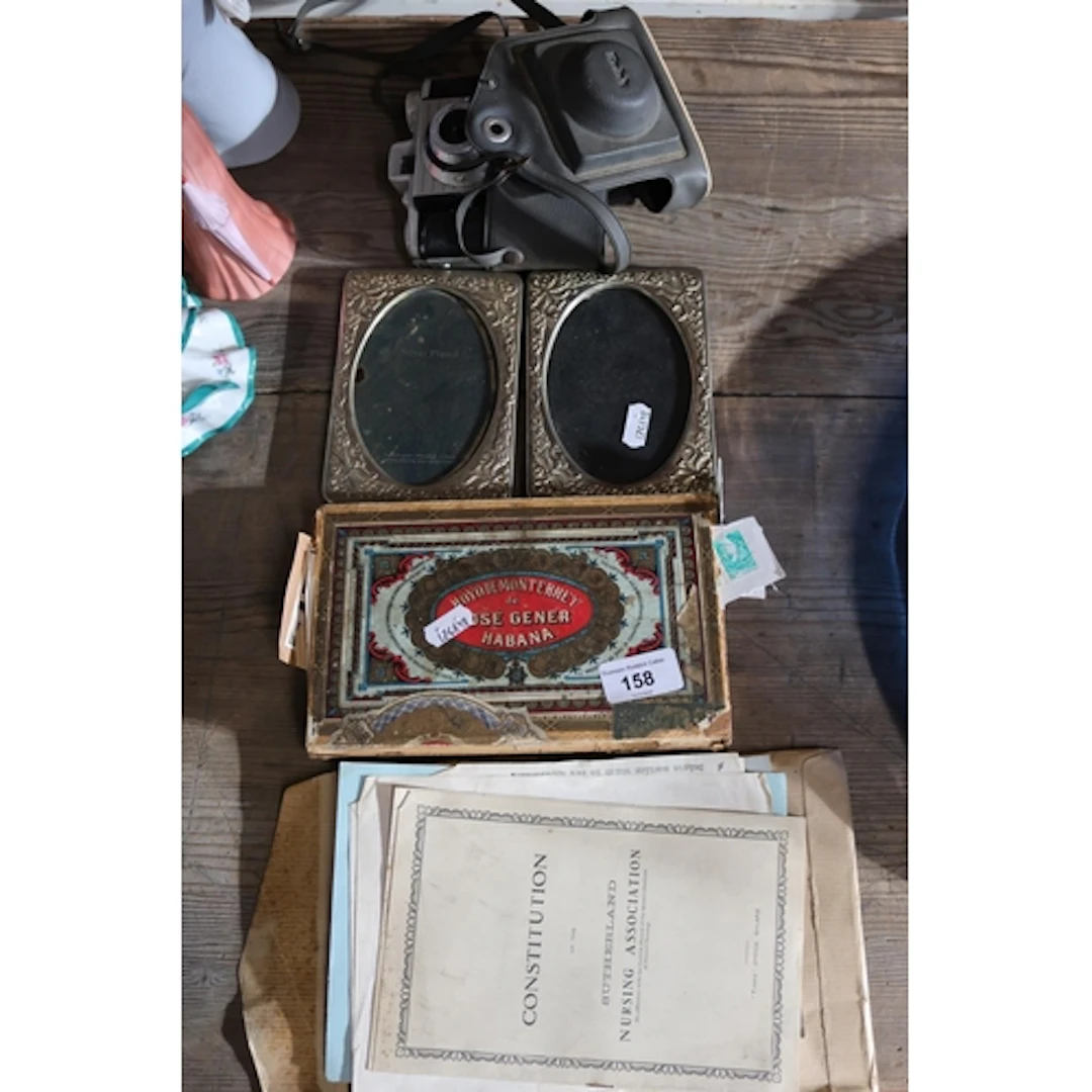 Silver plated picture frames, ephemera, loose stamps, camera...