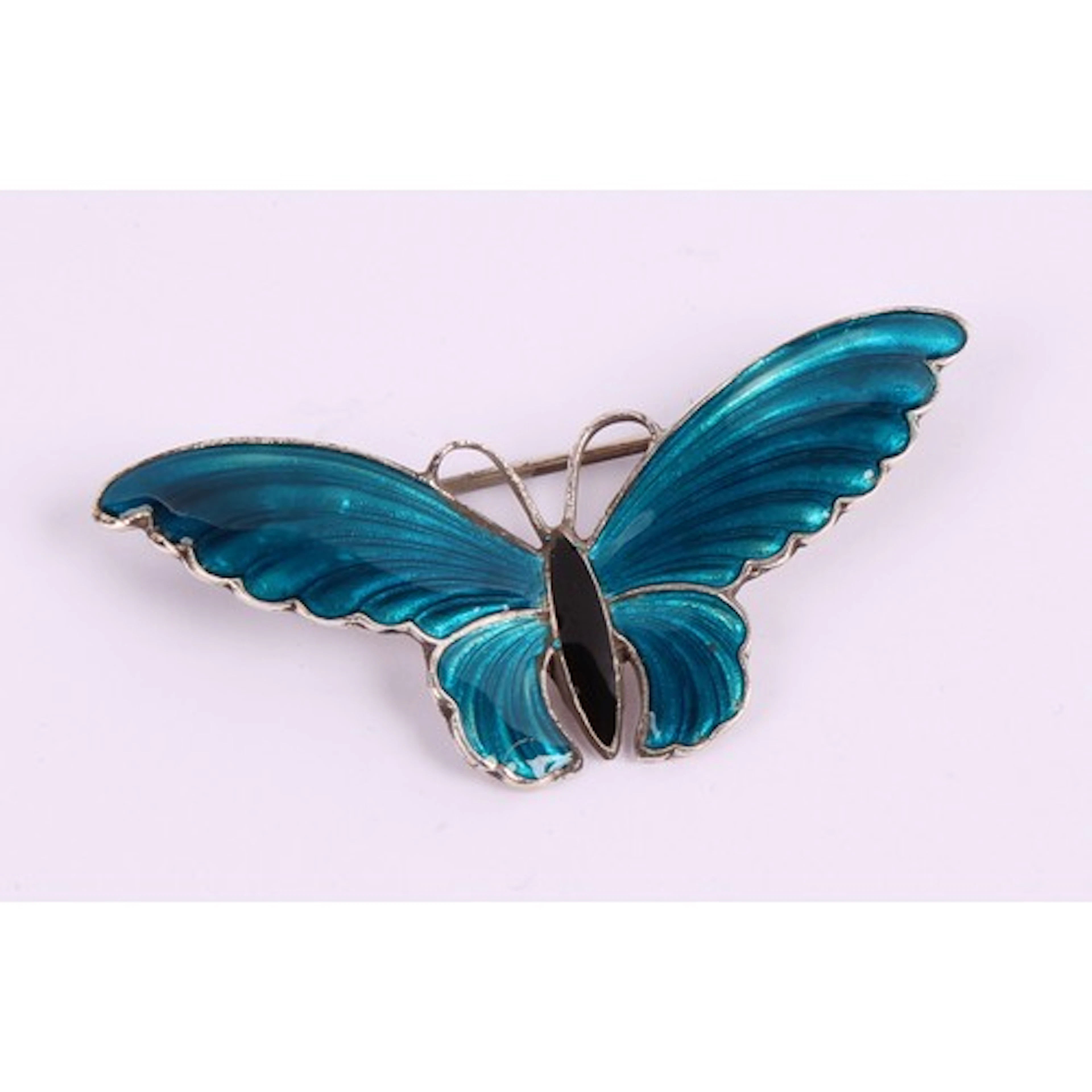 A Norwegian 925 silver and enamel brooch, in the style of Ha...