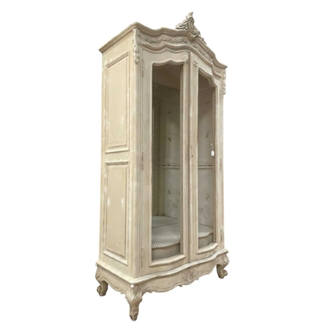 A Laura Ashley manner white-painted French-style kitchen dre...