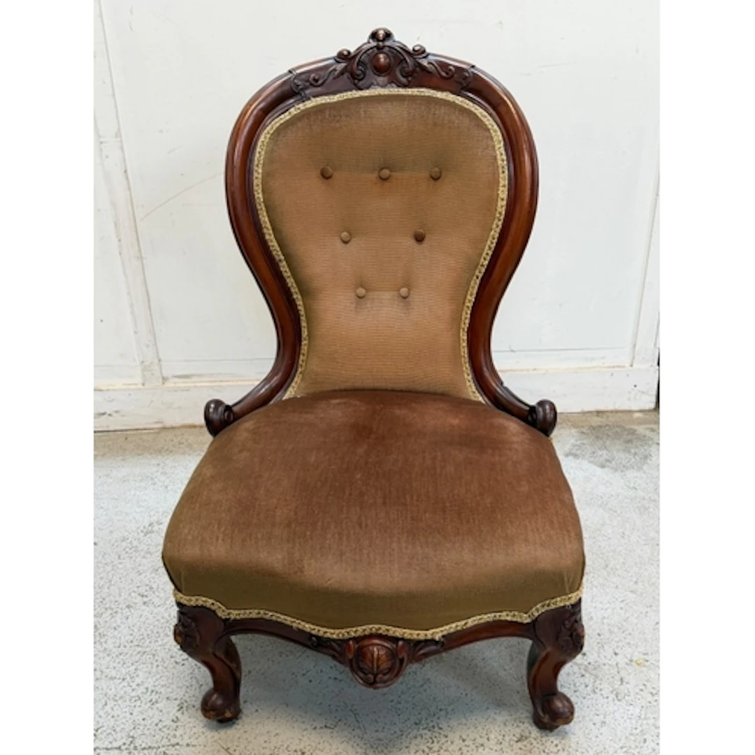 A Victorian spoon back nursing chair or slipper chair
