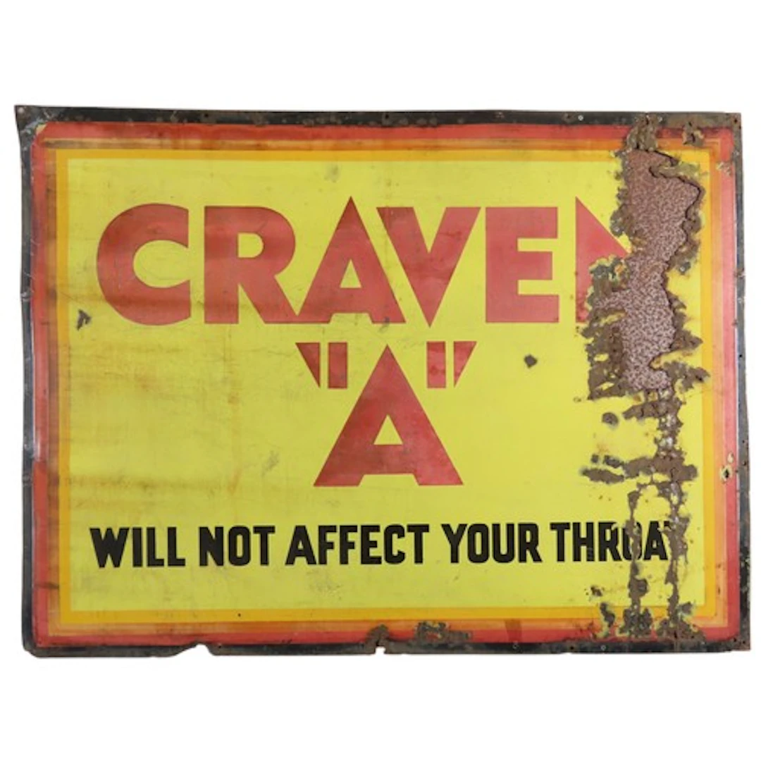 A VINTAGE CRAVEN 'A' ENAMELED ADVERTISING SIGN inscribed 'Cr...