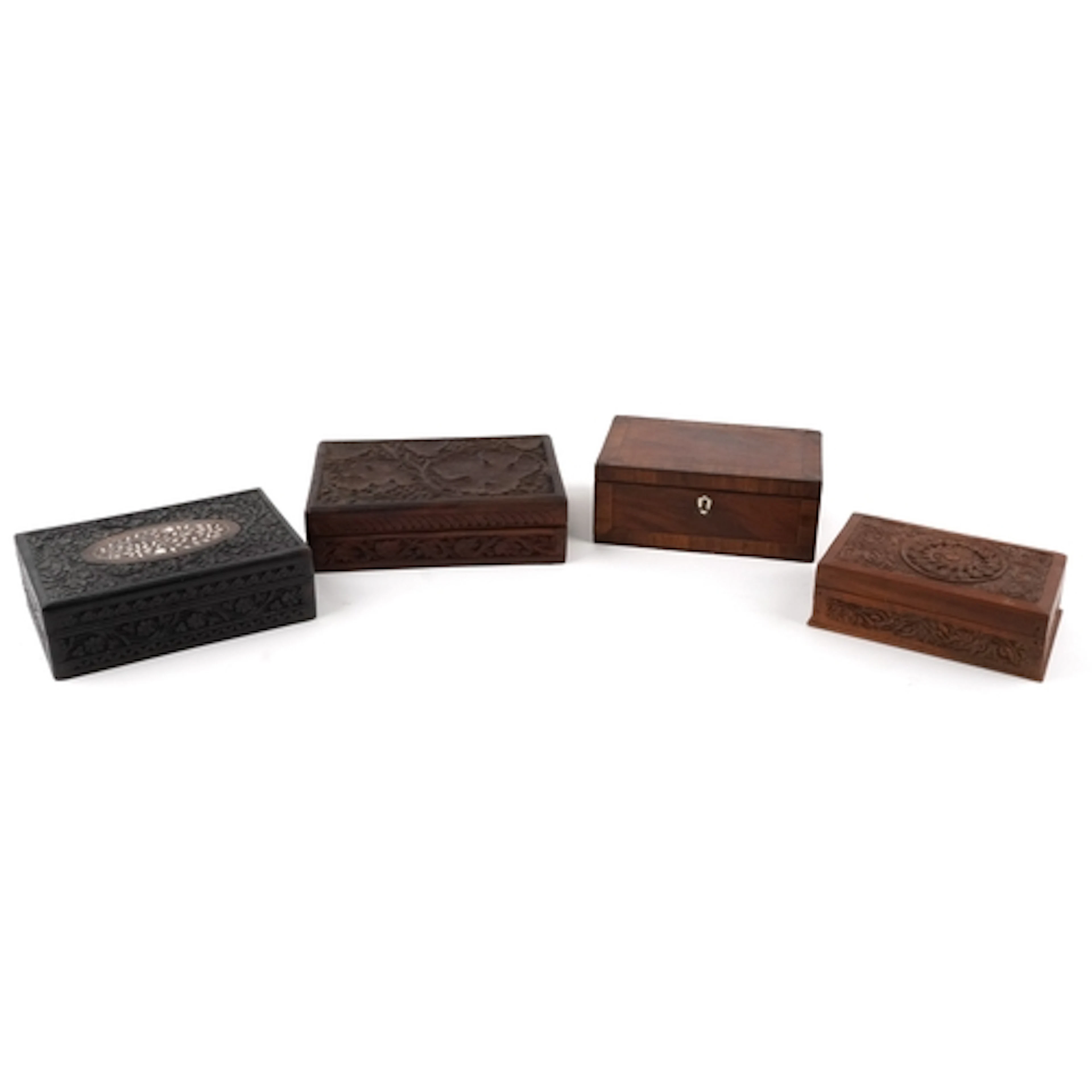 Three Eastern carved wood boxes, one with hand painted decor...