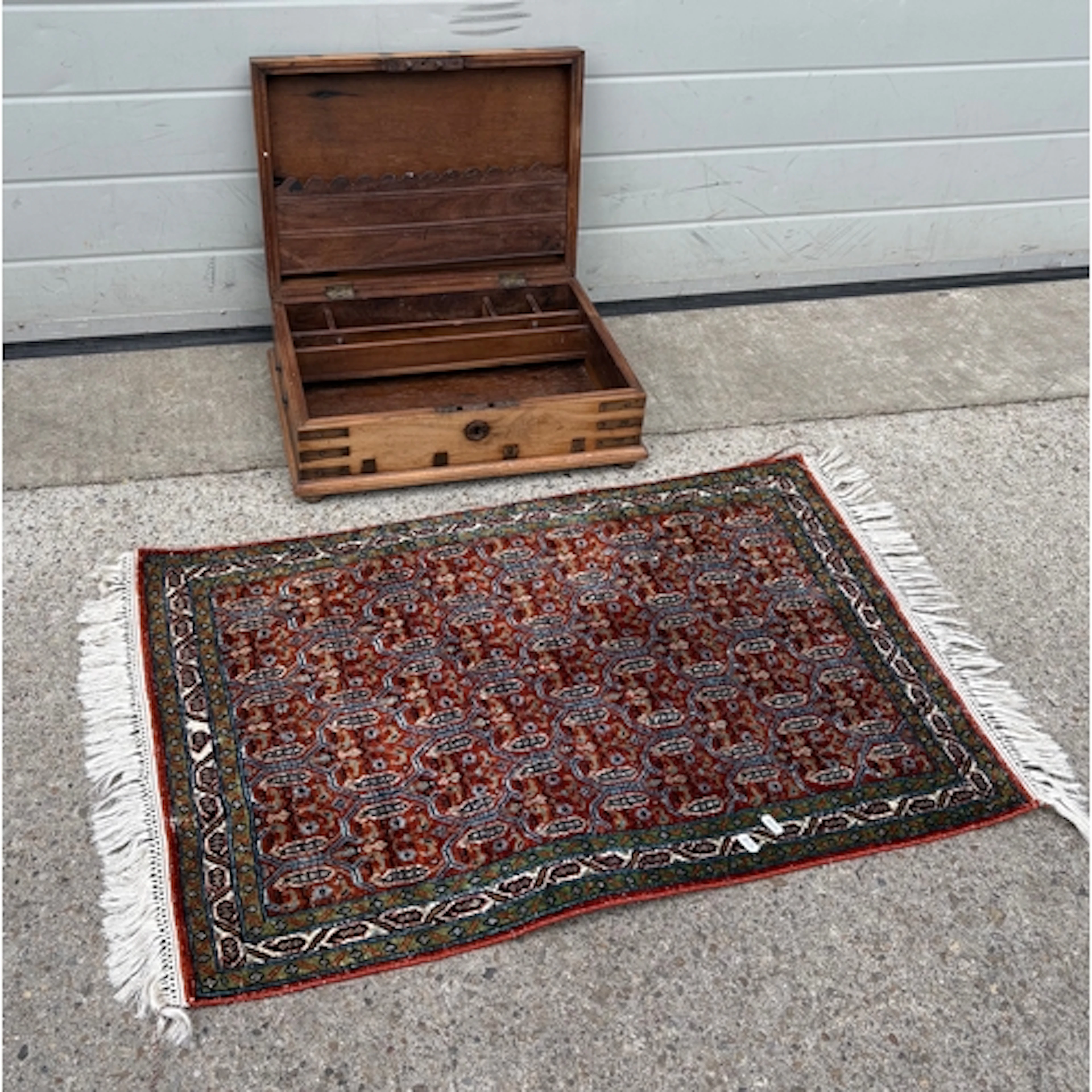 A small Kashmir (India) rug, 92cm long, together with a hard...