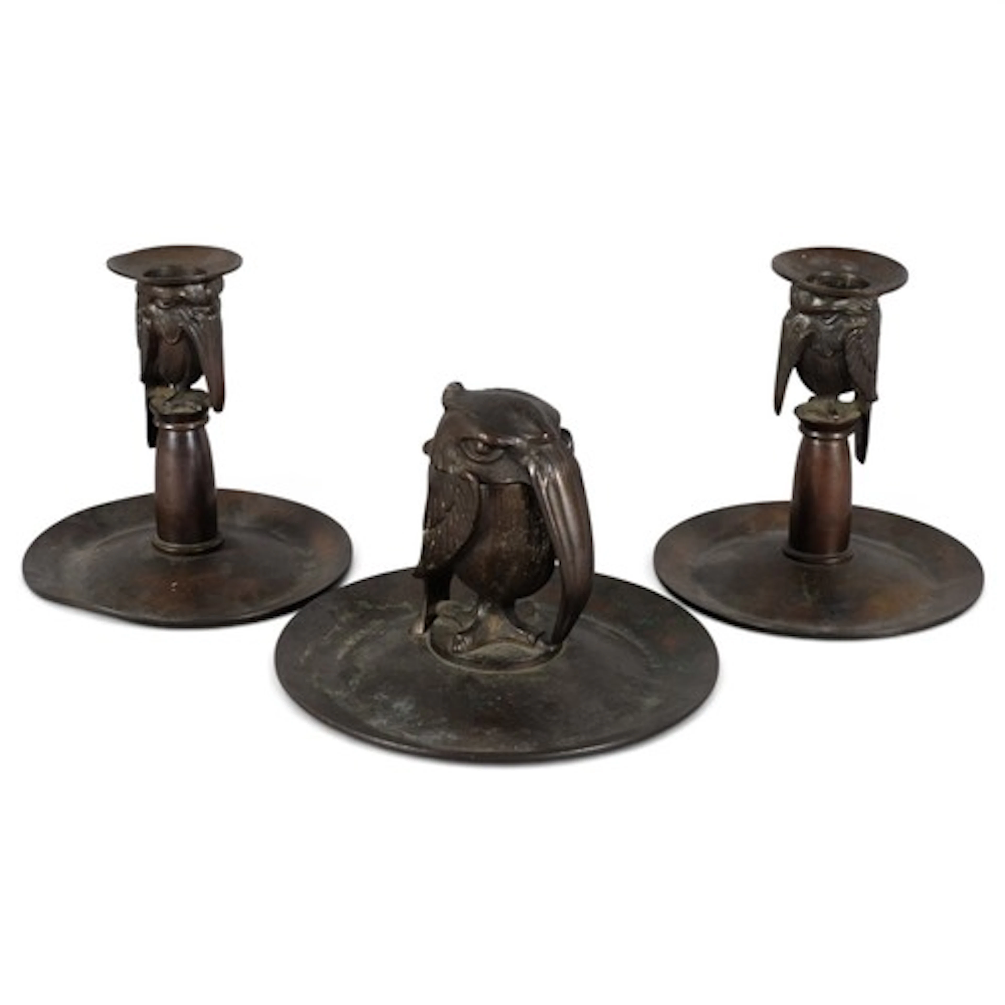 A bronze combined inkwell and chamber stick by William Tonks...