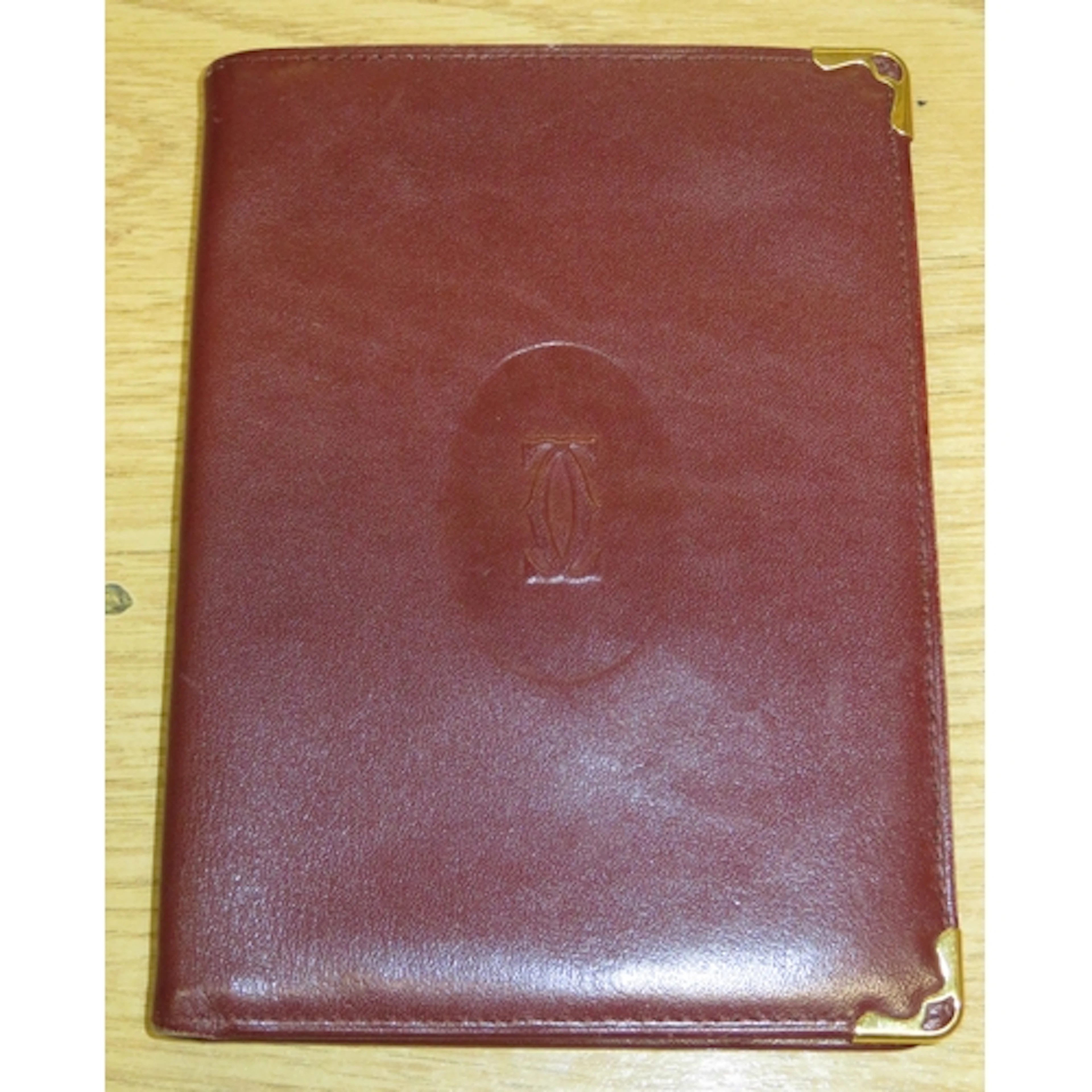 Cartier Paris burgundy leather wallet