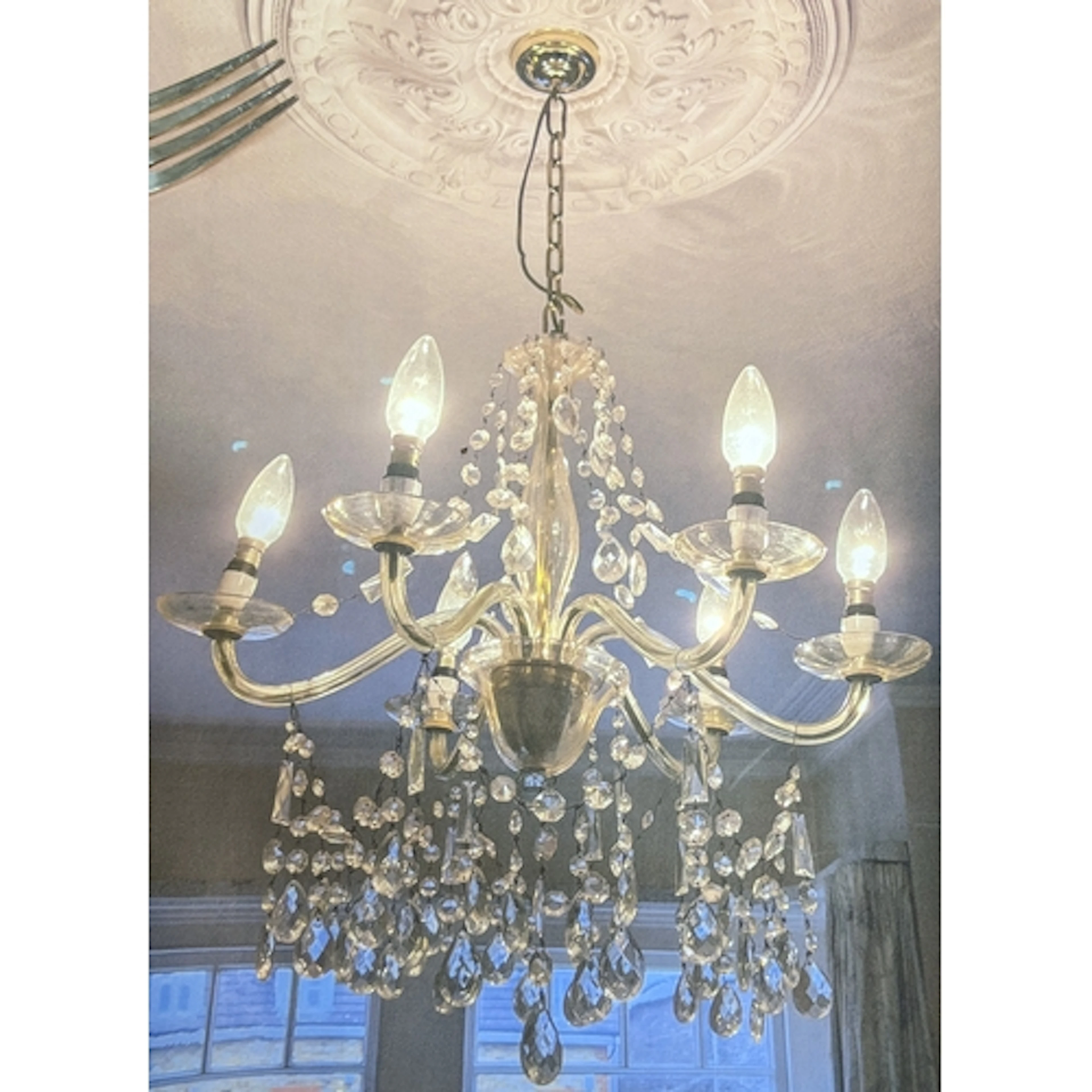 A vintage glass six-branch candelabra with faceted drops Loc...