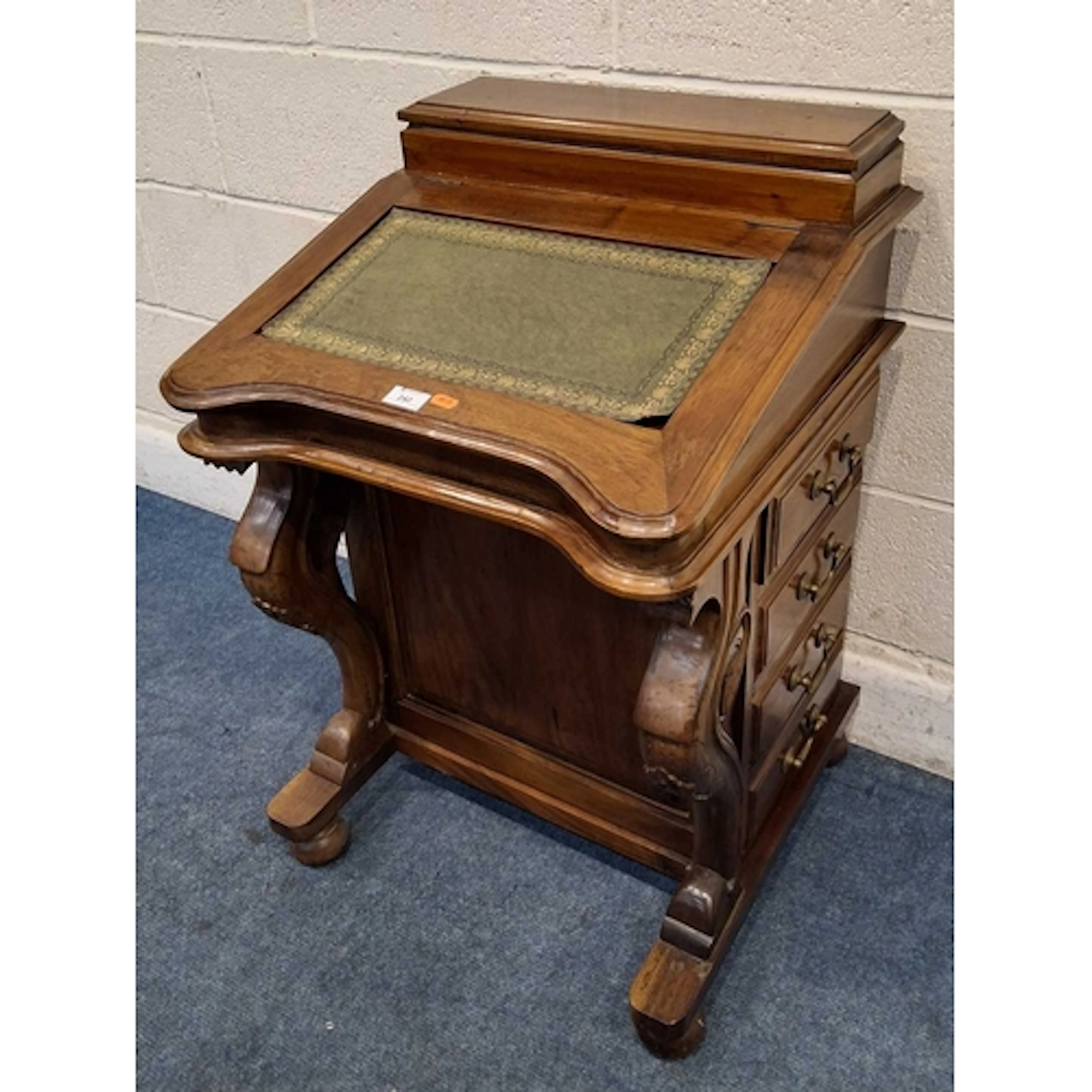 A REPRODUCTION DAVENPORT, with a small lidded compartment, t...