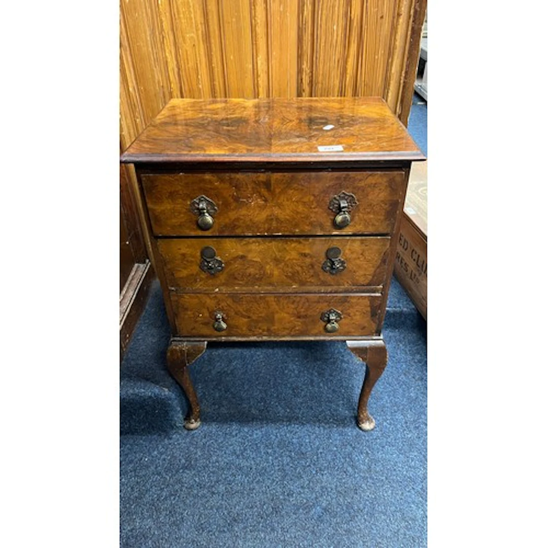 Mahogany bedside chest of three drawers, 72cm tall.