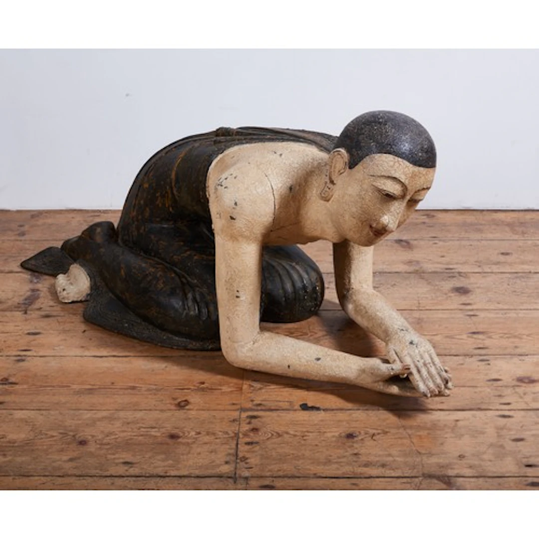 A LARGE BURMESE PAINTED WOOD FIGURE OF A KNEELING MONK 20TH ...