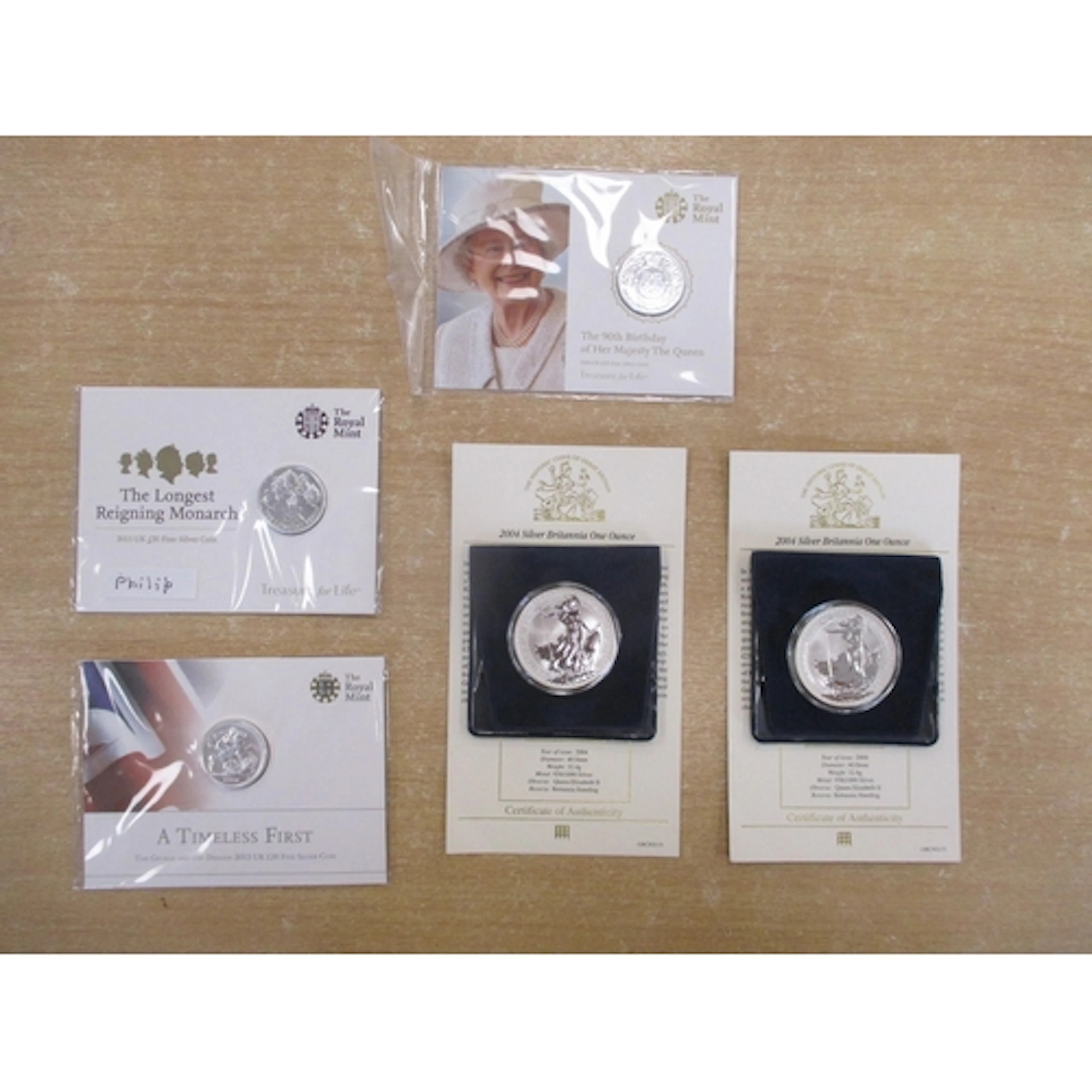 Collection of GB uncirculated silver includes sealed, inset ...