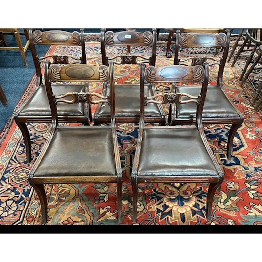 Set of five Regency mahogany dining chairs with sabre suppor...