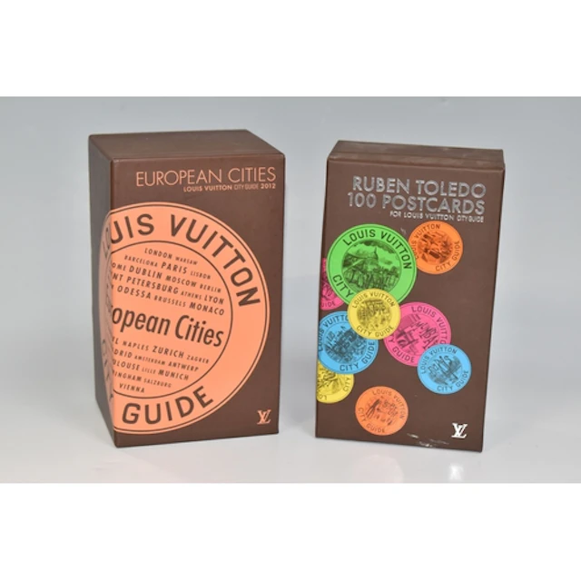 TWO BOXSETS OF LOUIS VUITTON CITY GUIDES AND POSTCARDS to in...