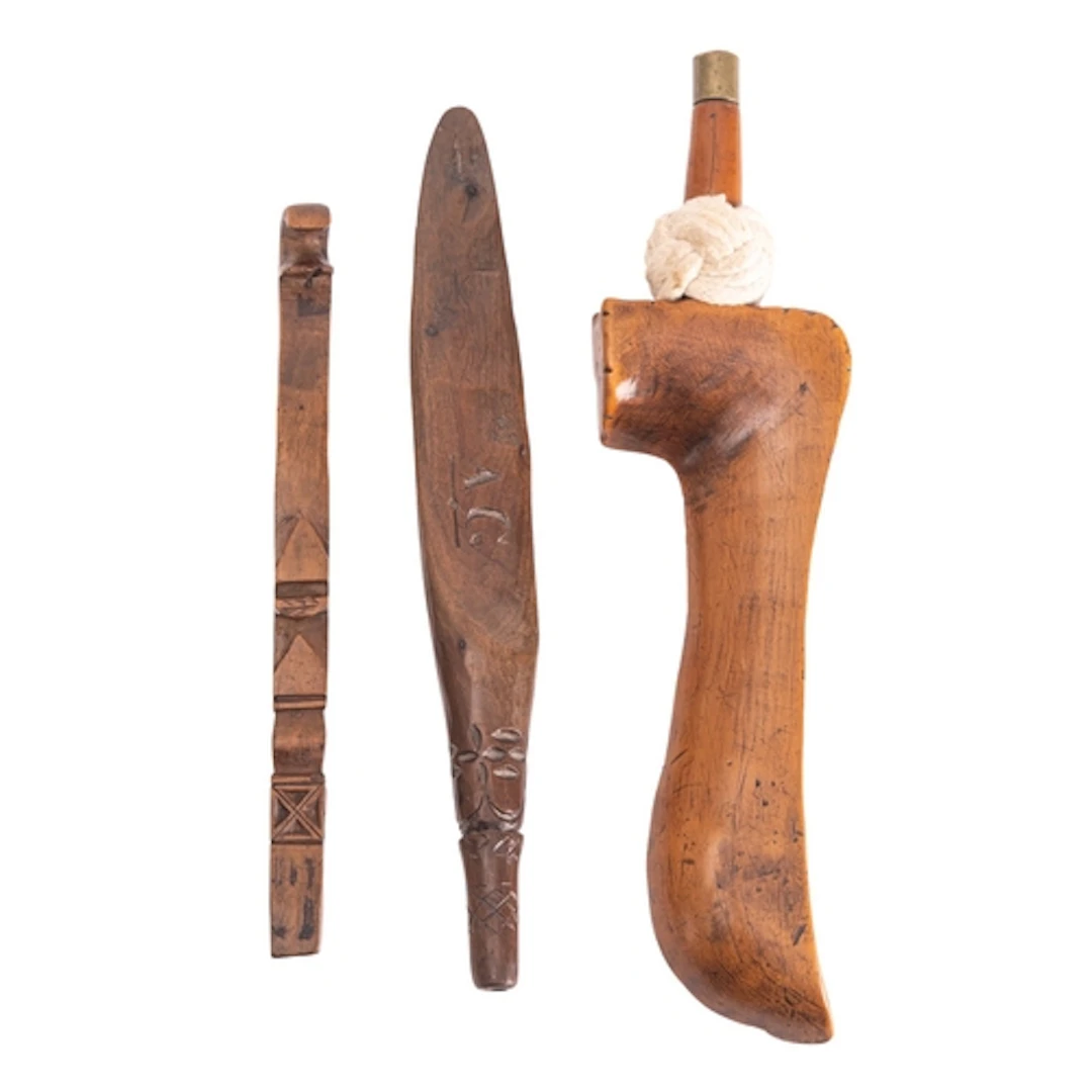 Two treen knitting sheaths, 19th century; the largest exampl...