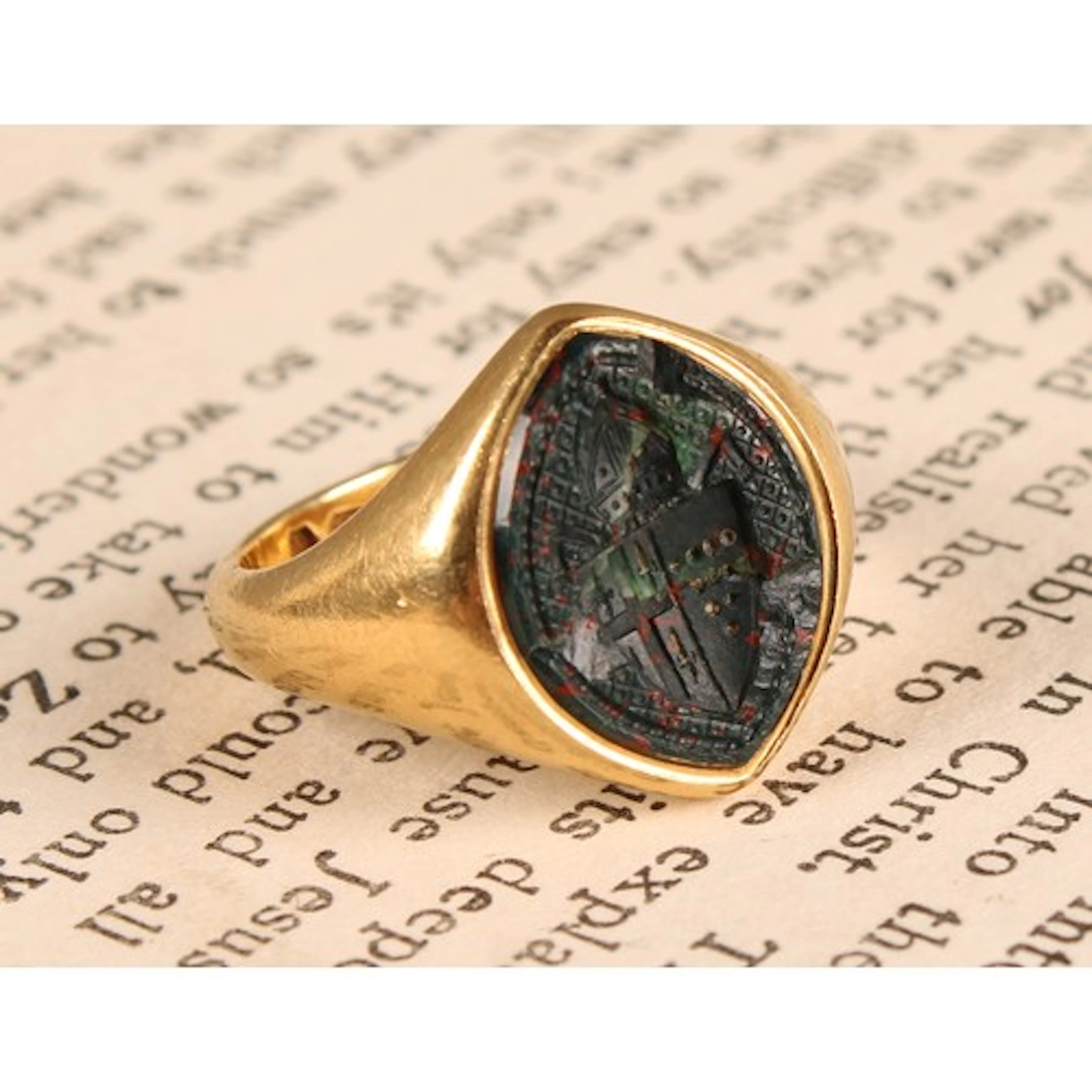 A Victorian 18ct gold bishop's seal signet ring, set with a ...