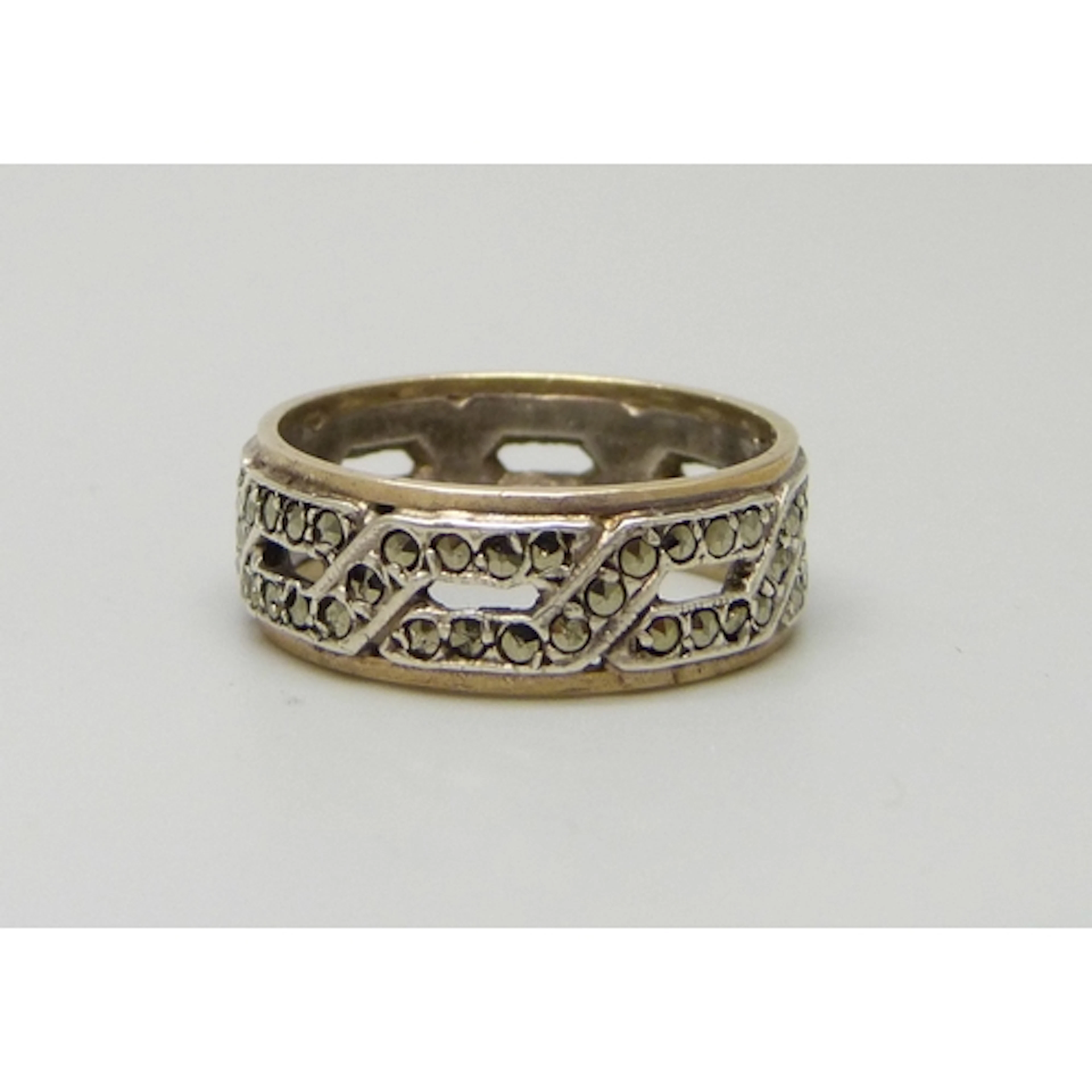 A 9ct gold and silver ring set with marcasite, some stones m...